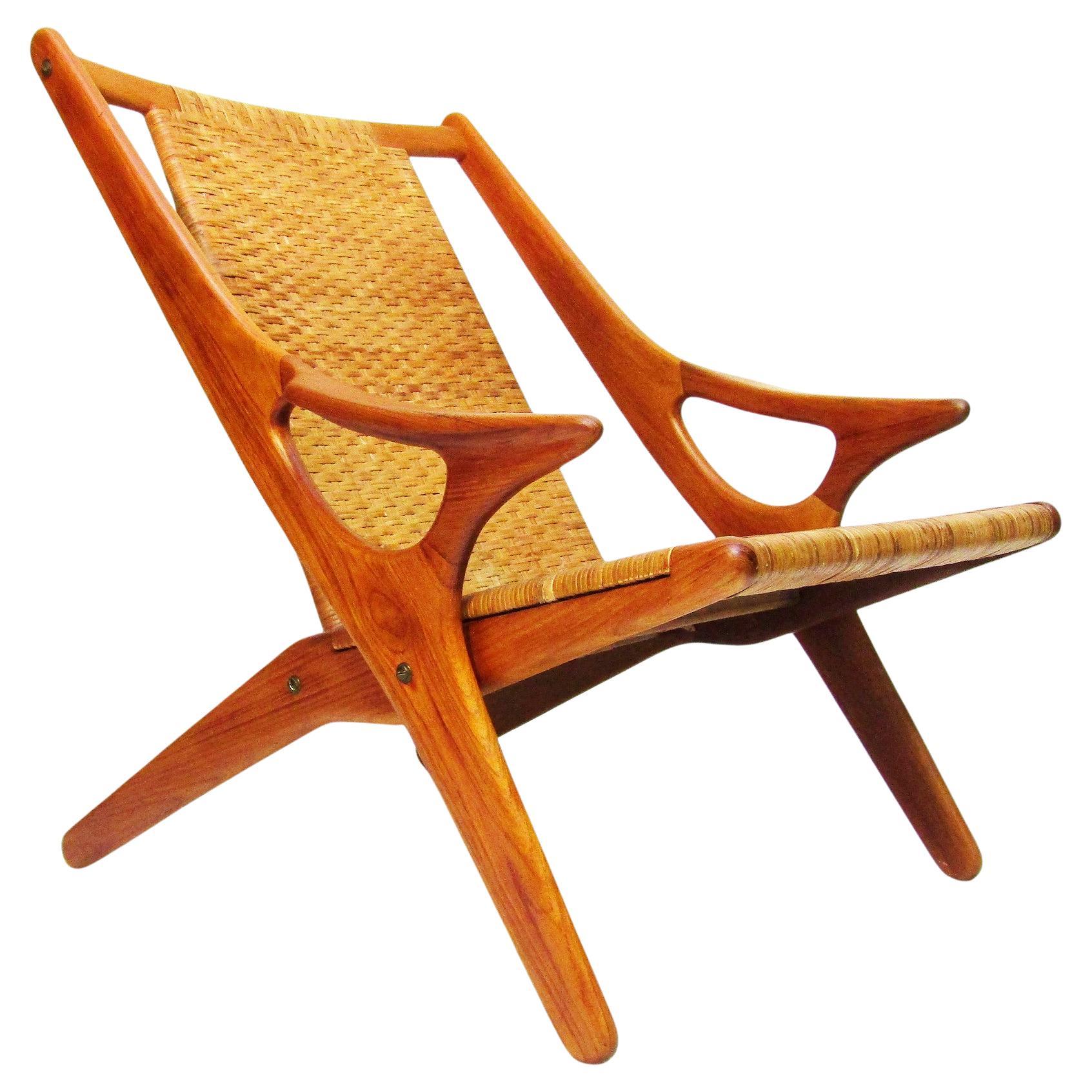 1950s Danish "Model 300" Lounge Chair in Teak & Cane by Arne Hovmand Olsen For Sale