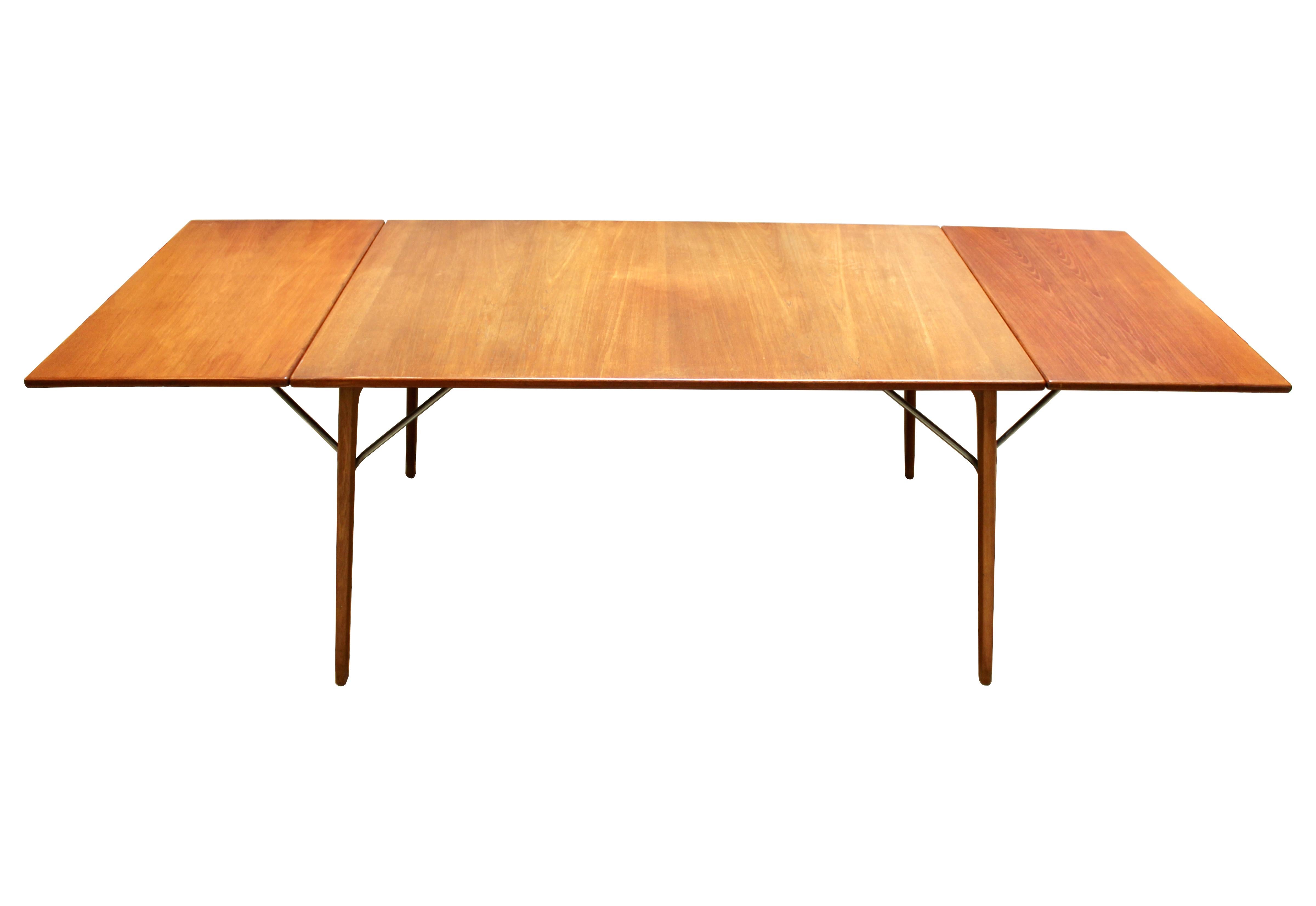Danish Modern Børge Mogensen model 162 teak dining table for Søborg Møbelfabrik, circa 1953. The table has two removable drop leaves; each leaf adds 19.5” and the table measures 94” wide at full extension. In excellent condition.

Width: 55 in /