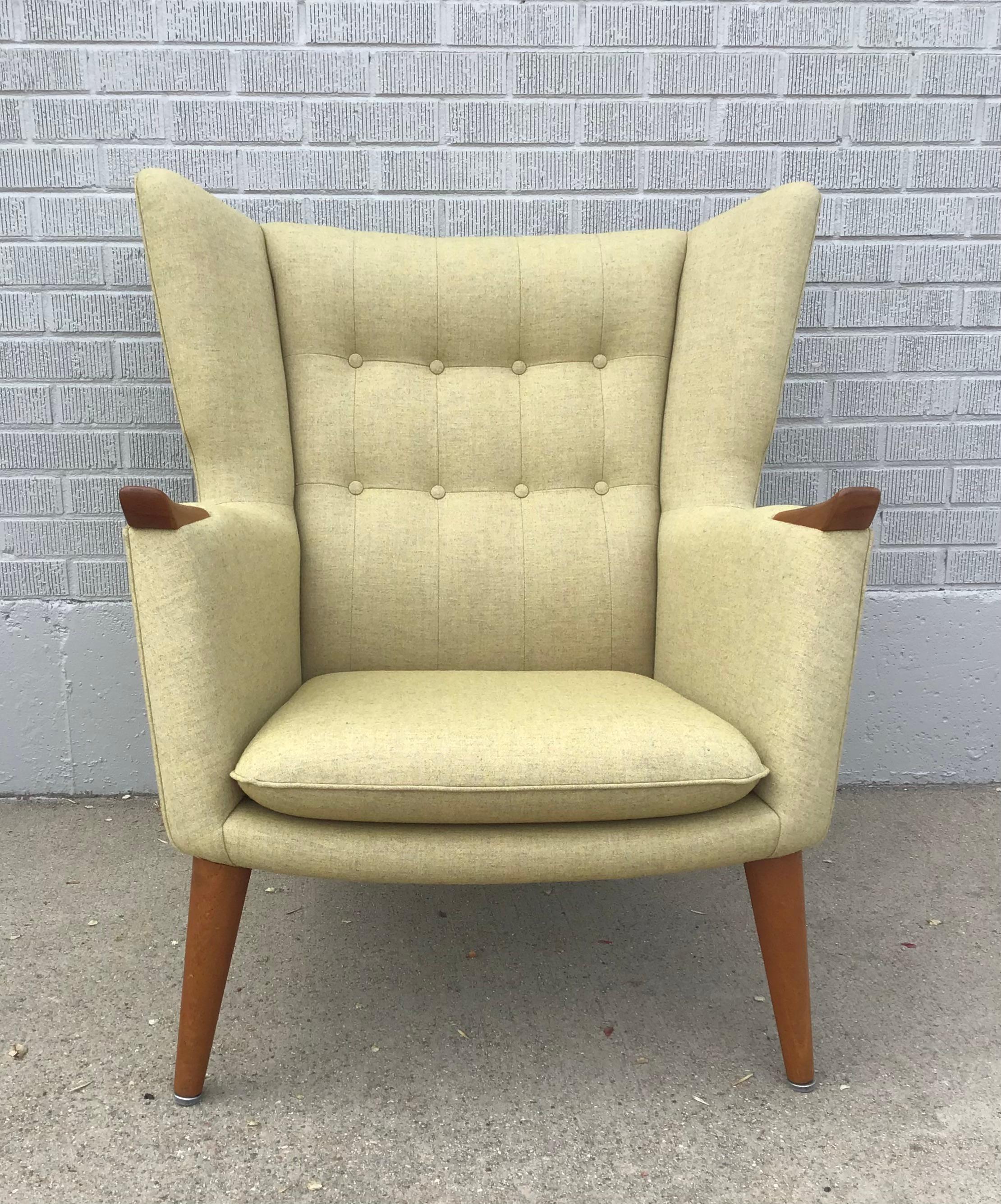 Fabulous 1950s Danish armchair that has been reupholstered in recent years by Morentz in Holland. This chair had been purchased and shipped from Denmark. It features paws similar to a Mama Bear Chair or a Papa Bear Chair.

Designer/Maker is unknown,