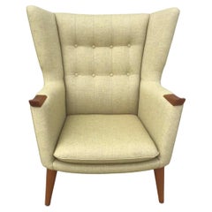 1950s Danish Modern Teak Paw Wingback Armchair in Tweed Fabric
