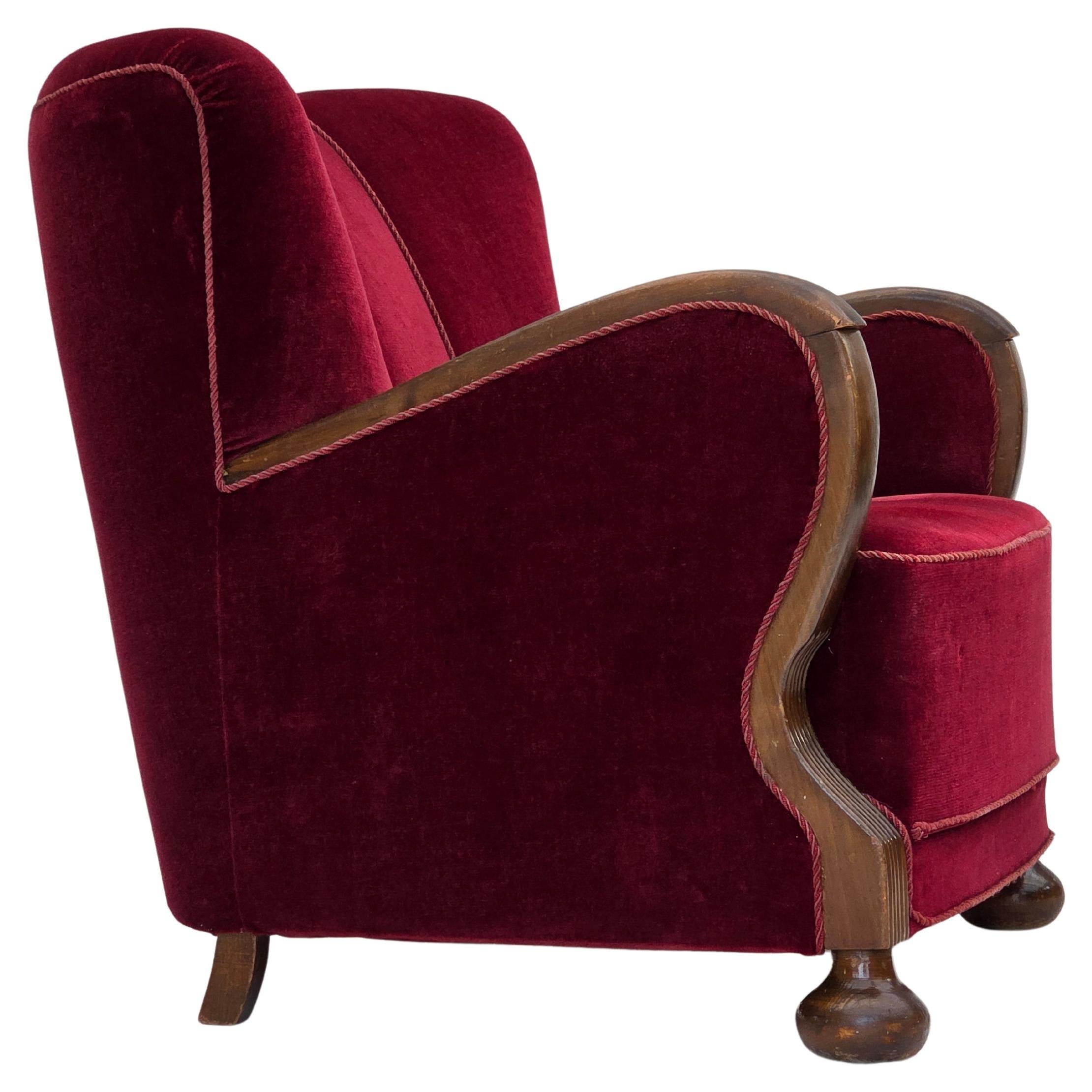 1950s, Danish relax armchair, cherry-red furniture velour, dark beech wood.