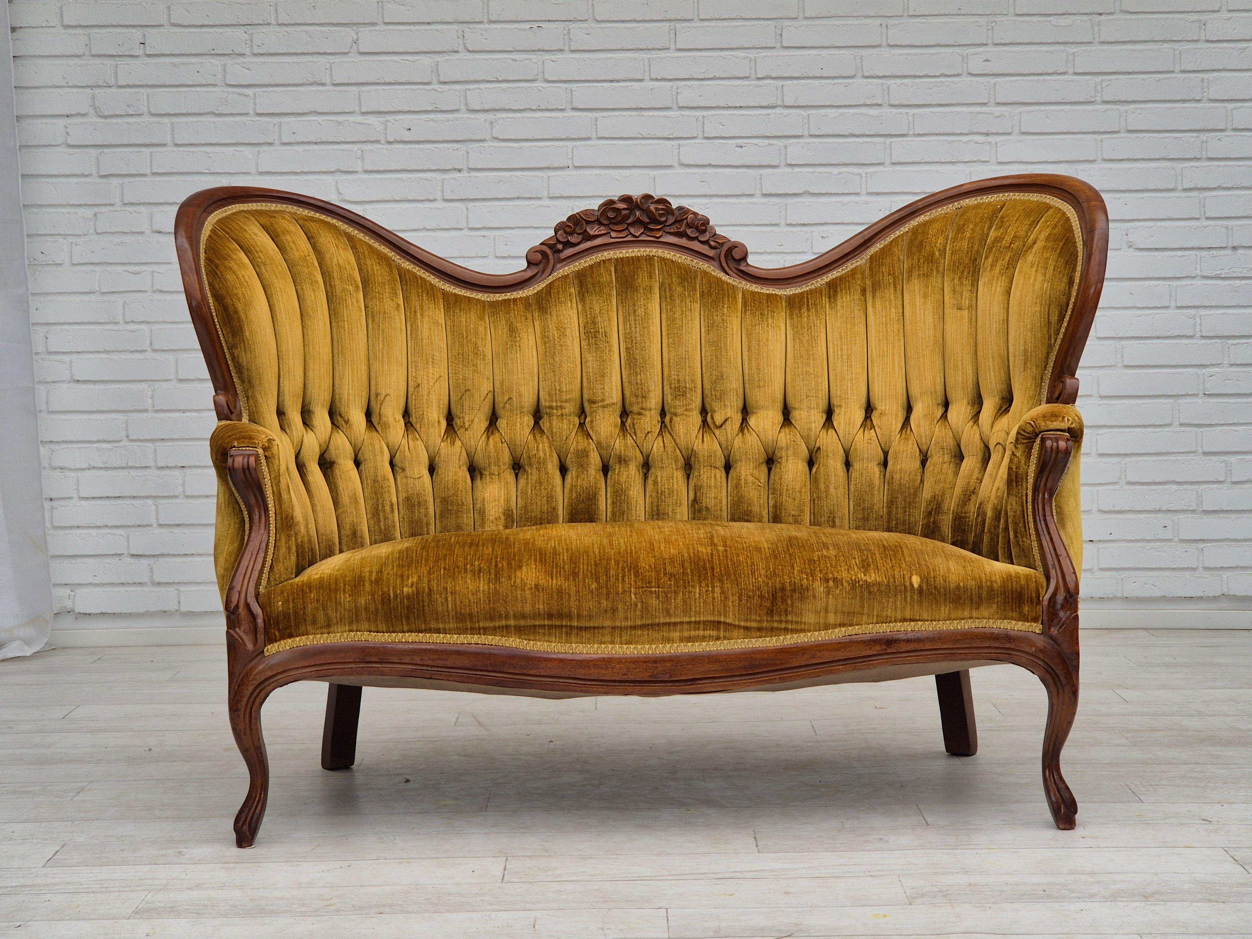 1950s, Danish sofa in yellow vintage furniture velour. Very good condition: no smells, no stains, stable construction. Sofa was reupholstered about 15 years ago by craftsman. Brass springs in the seat, mahogany wood. Manufactured by Danish furniture