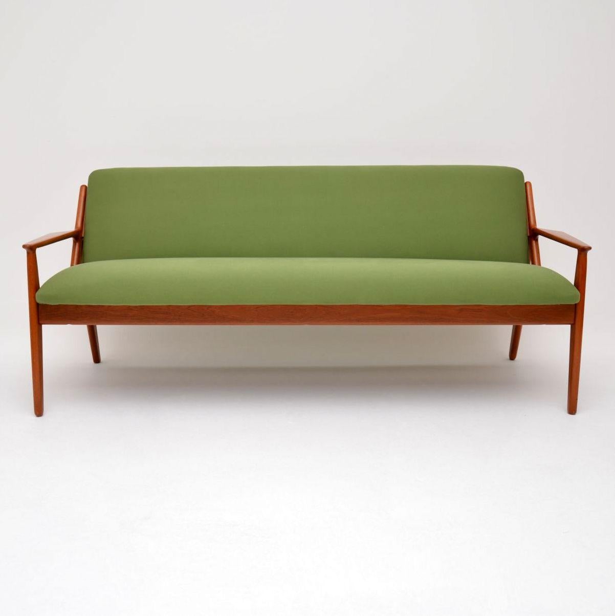 An absolutely stunning and extremely rare vintage danish sofa in solid teak, this was designed by Arne Vodder and was made by Vamo in the 1950s-1960s. We have had the frame fully stripped and re-polished to a very high standard, we’ve also had this