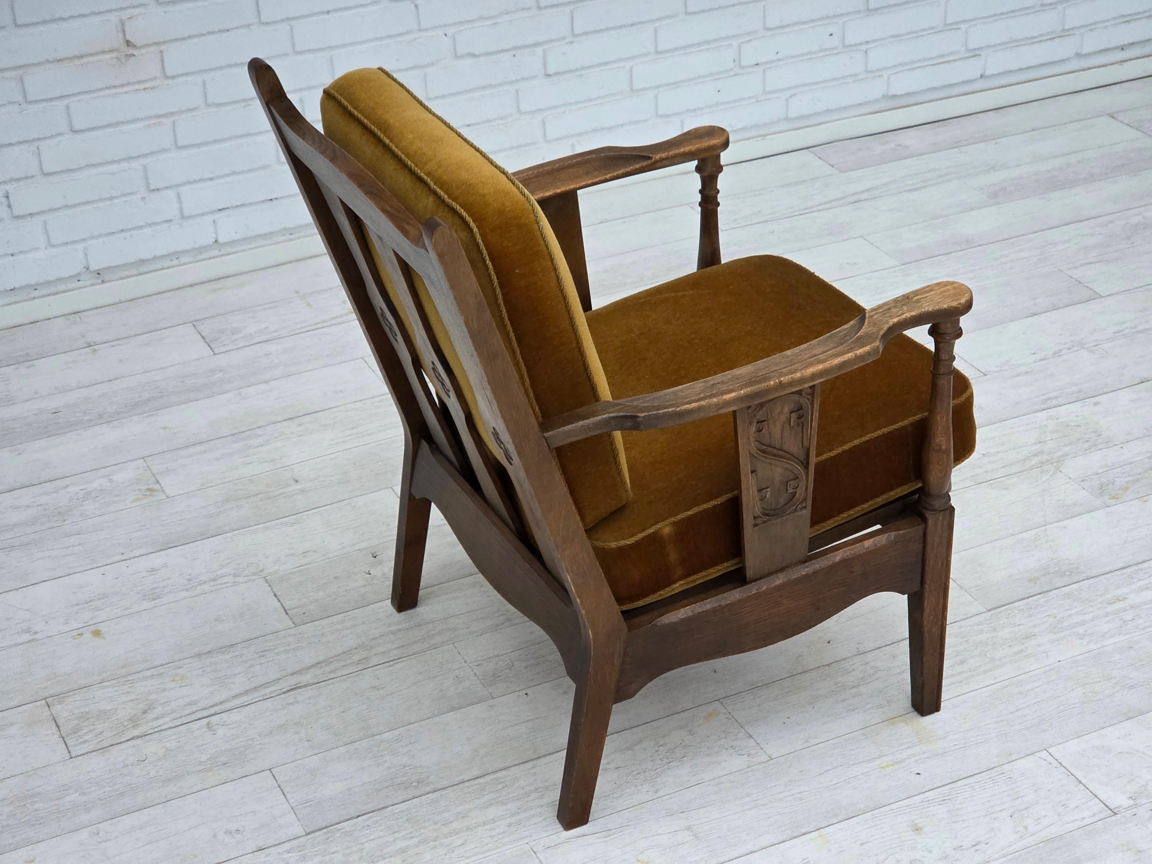 Velvet 1950s, Danish vintage armchair, original green furniture velour, oak wood. For Sale