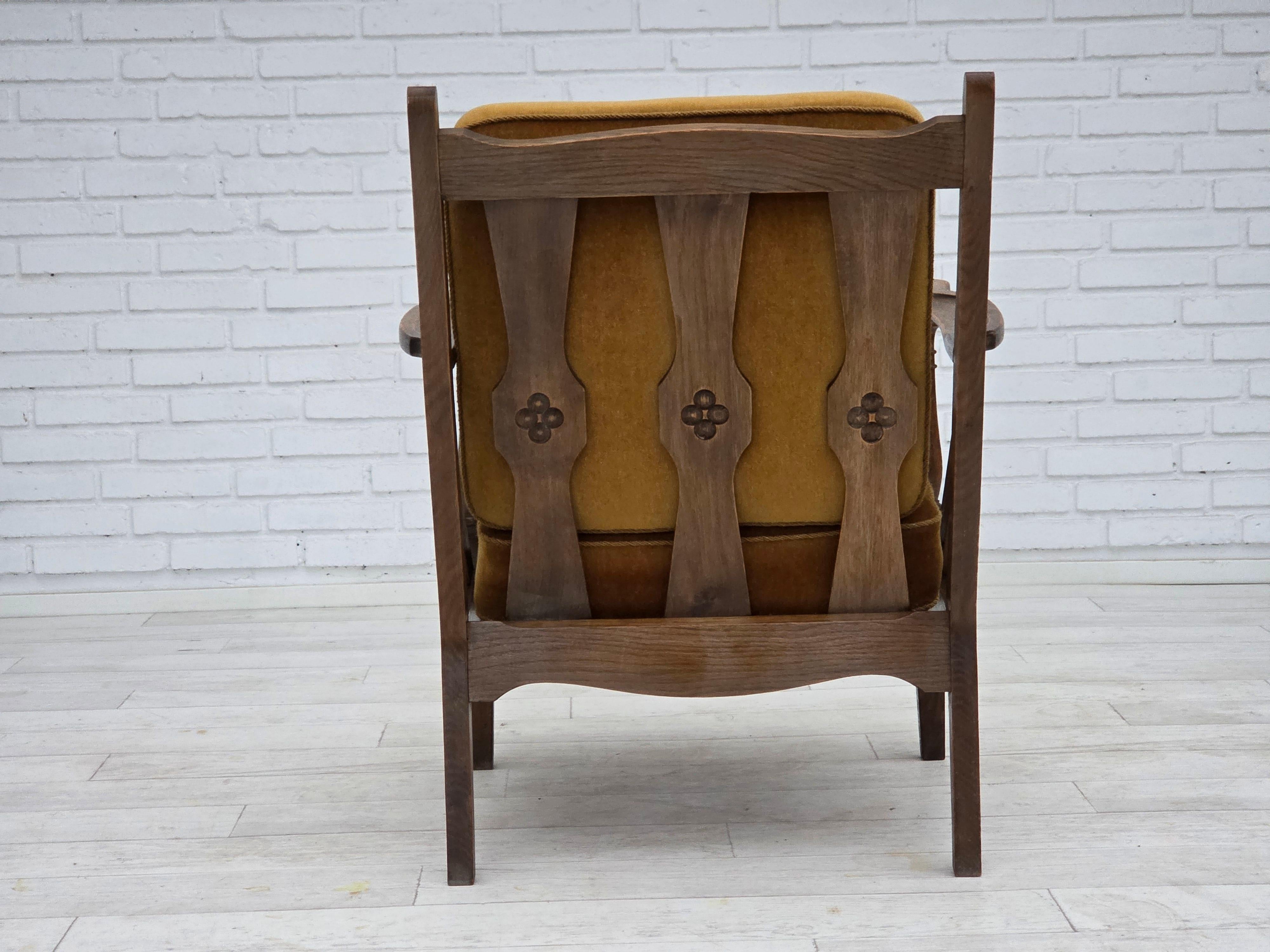 1950s, Danish vintage armchair, original green furniture velour, oak wood. For Sale 1