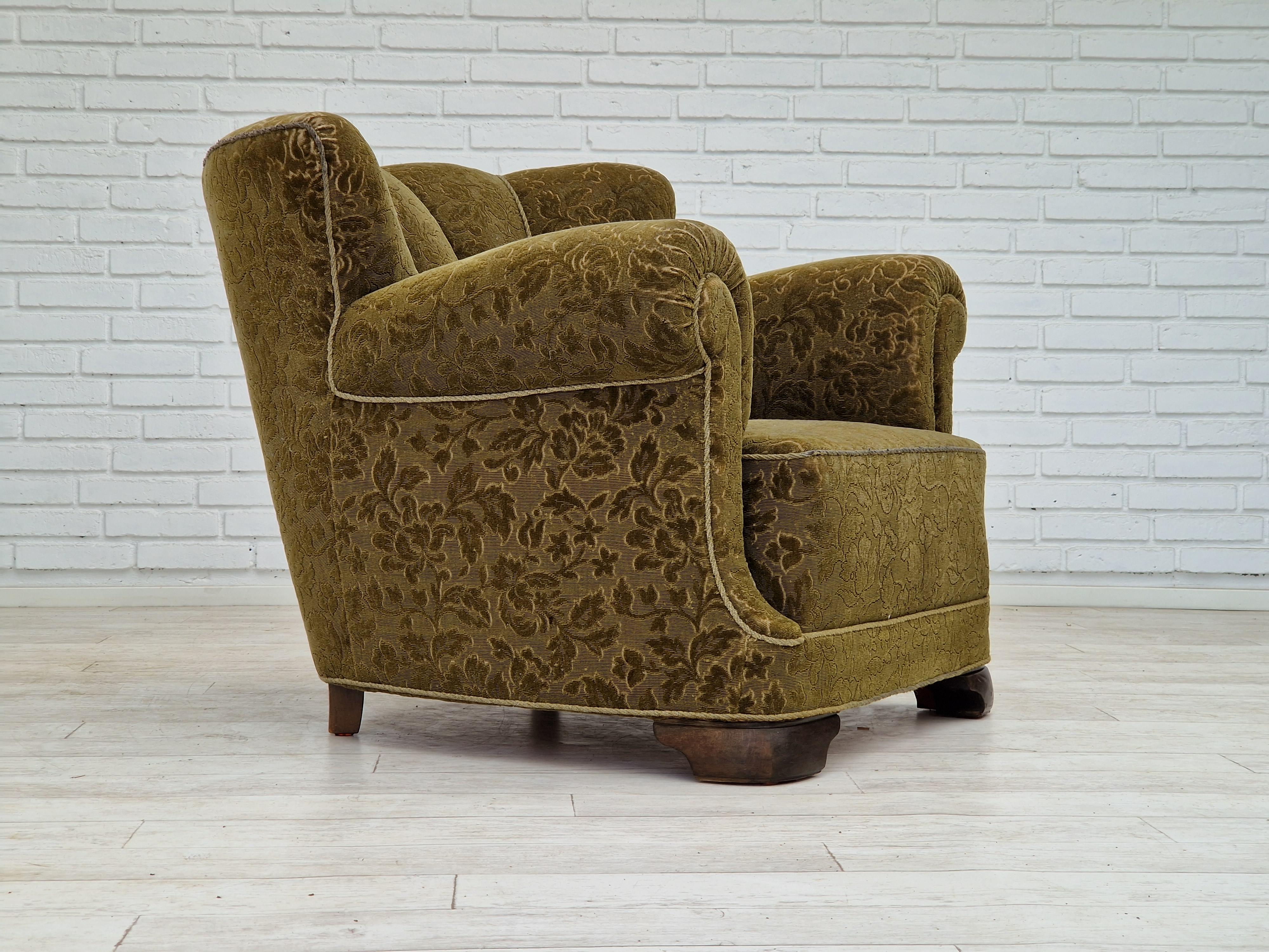 1950s, Danish design. Original relax chair in green fabric. Good condition: no smells and no stains, light wear/ patina on the top back and armrest. Brass springs in the seat. Made by Danish furniture manufacturer in about 1950-55