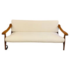 1950s Danish White Boucle with Cherrywood Sculptural Arms & Brass Sofa Couch