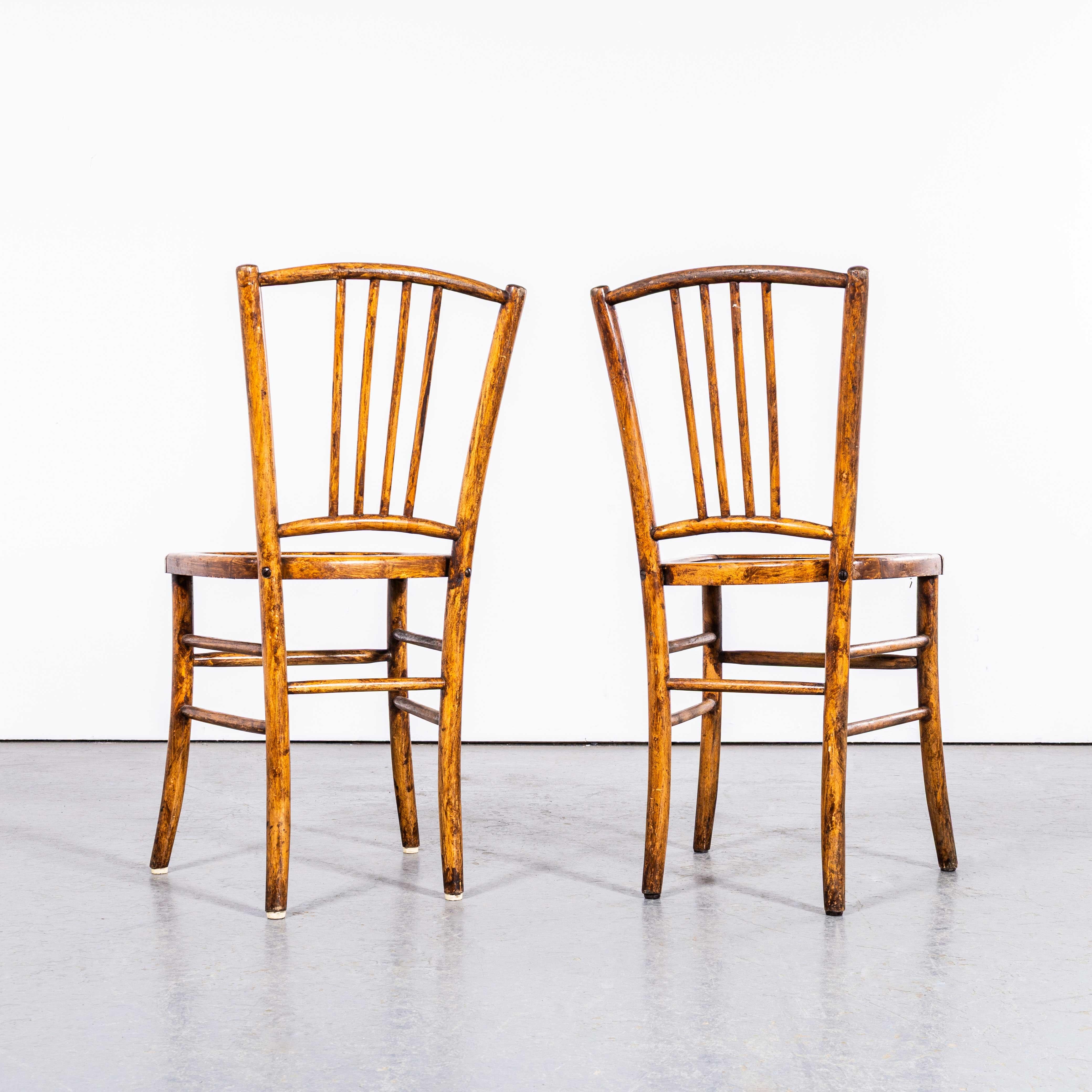 Milieu du XXe siècle Paire de chaises de salle à manger Luterma des années 1950 à dossier en tiges foncées en vente