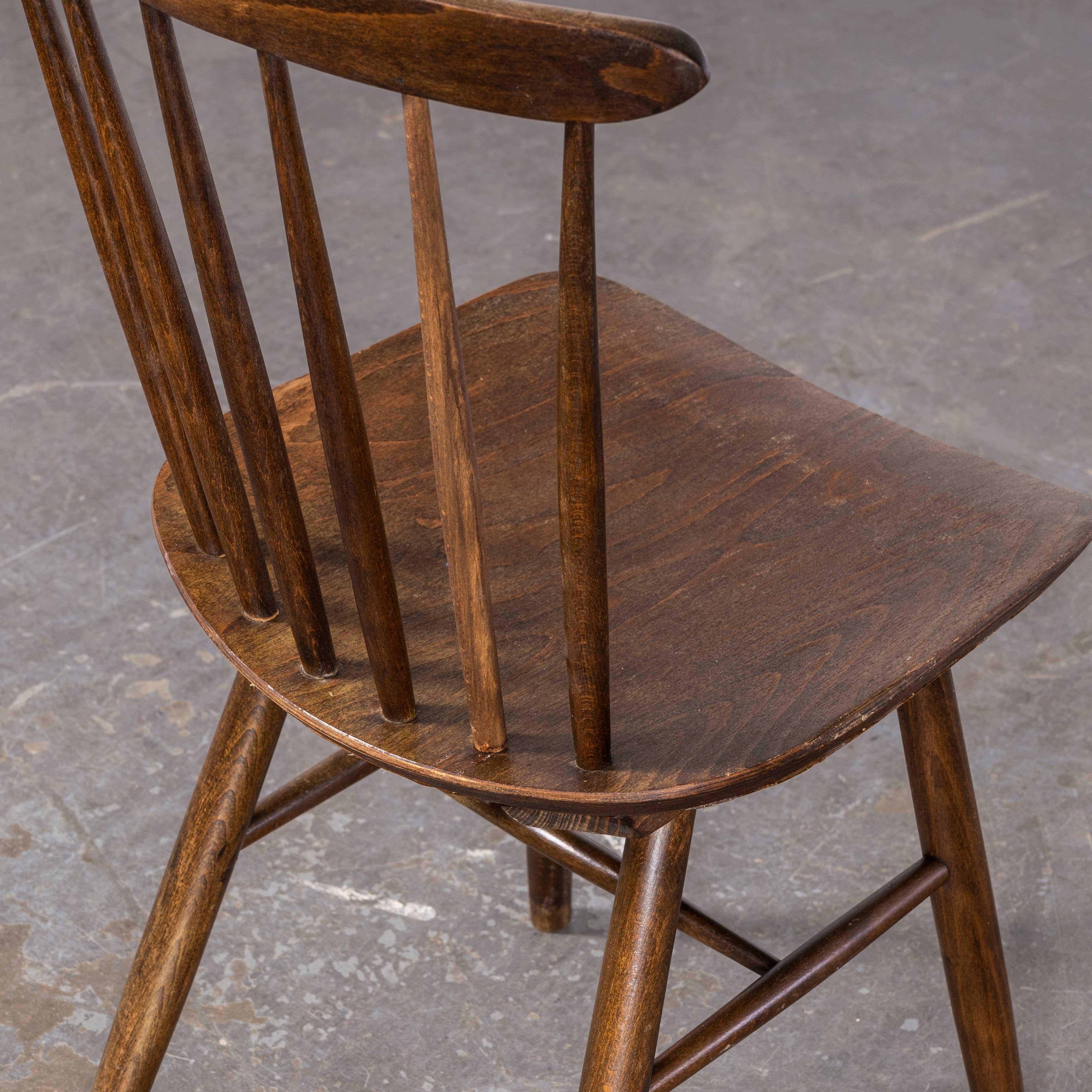 1950s Dark Walnut Stickback Chairs – Saddle Seat – By Ton – Set Of Four
1950s Dark Walnut Stickback Chairs – Saddle Seat – By Ton – Set Of Four. These chairs were produced by the famous Czech firm Ton, a post war spin off from the famous Thonet