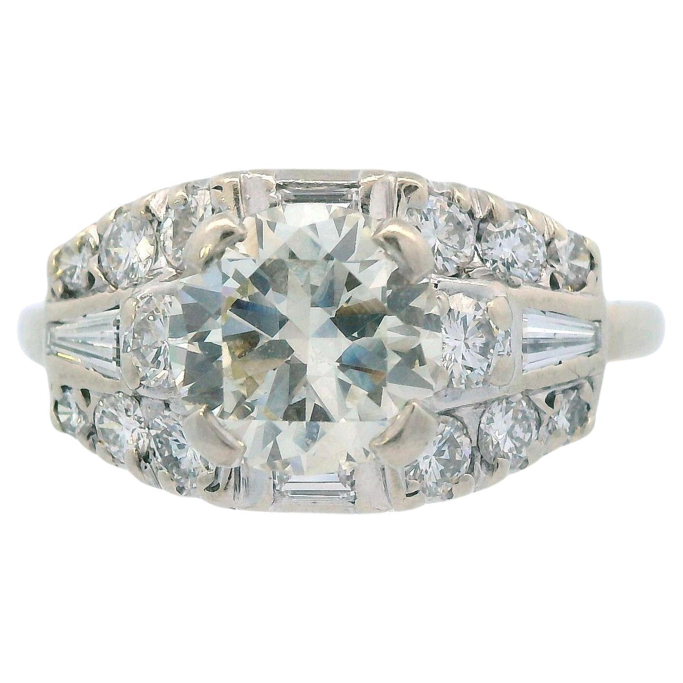 1950s Deco 14k White Gold and Round/Baguette Diamond Ring