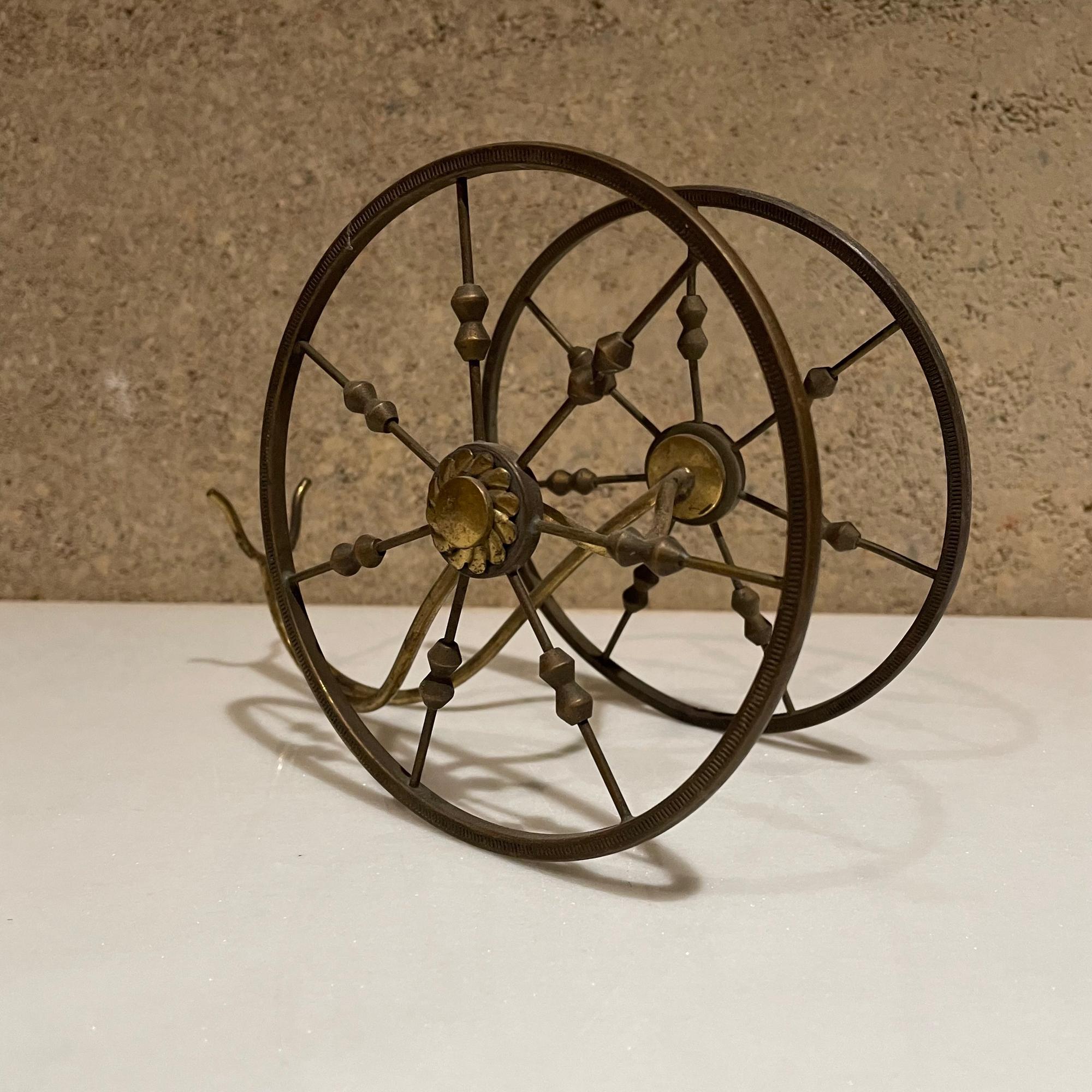 Mid-Century Modern 1950s Decorative Wine Bottle Holder Spoke Wheel in Sculptural Brass from Italy  