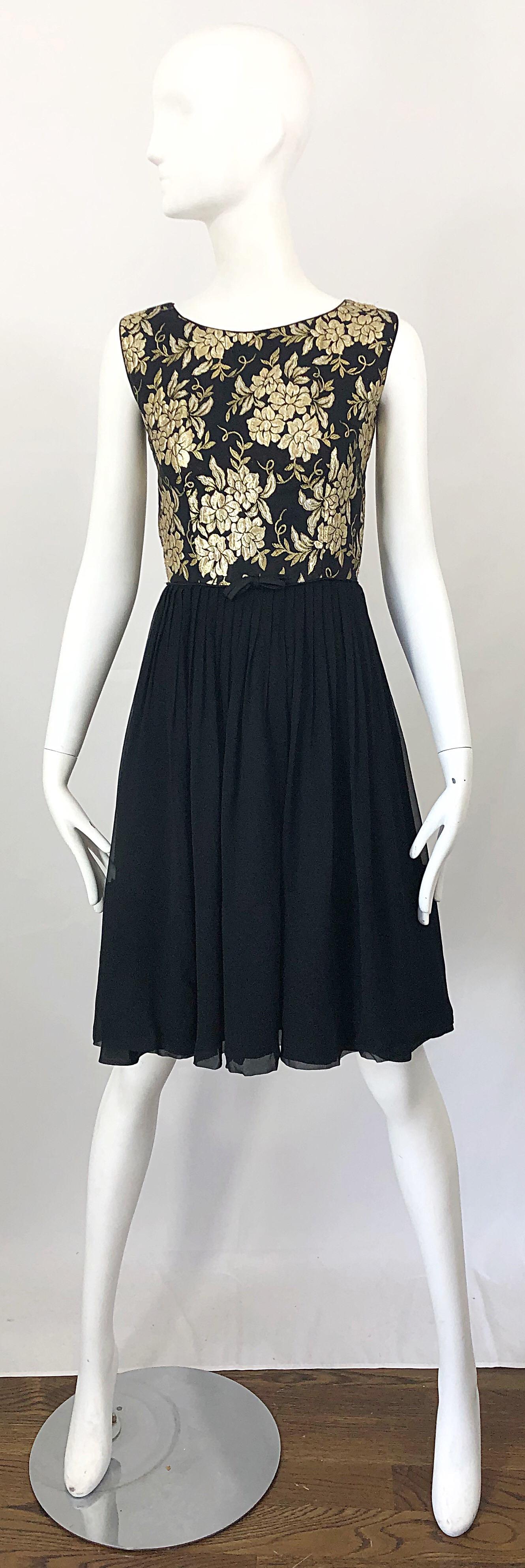 Beautiful 1950s demi couture gold and black silk brocade and chiffon cocktail dress! Features a tailored gold and black silk flower brocade bodice, with a forgiving black silk chiffon skirt. Full metal zipper up the back with hook-and-eye closure.