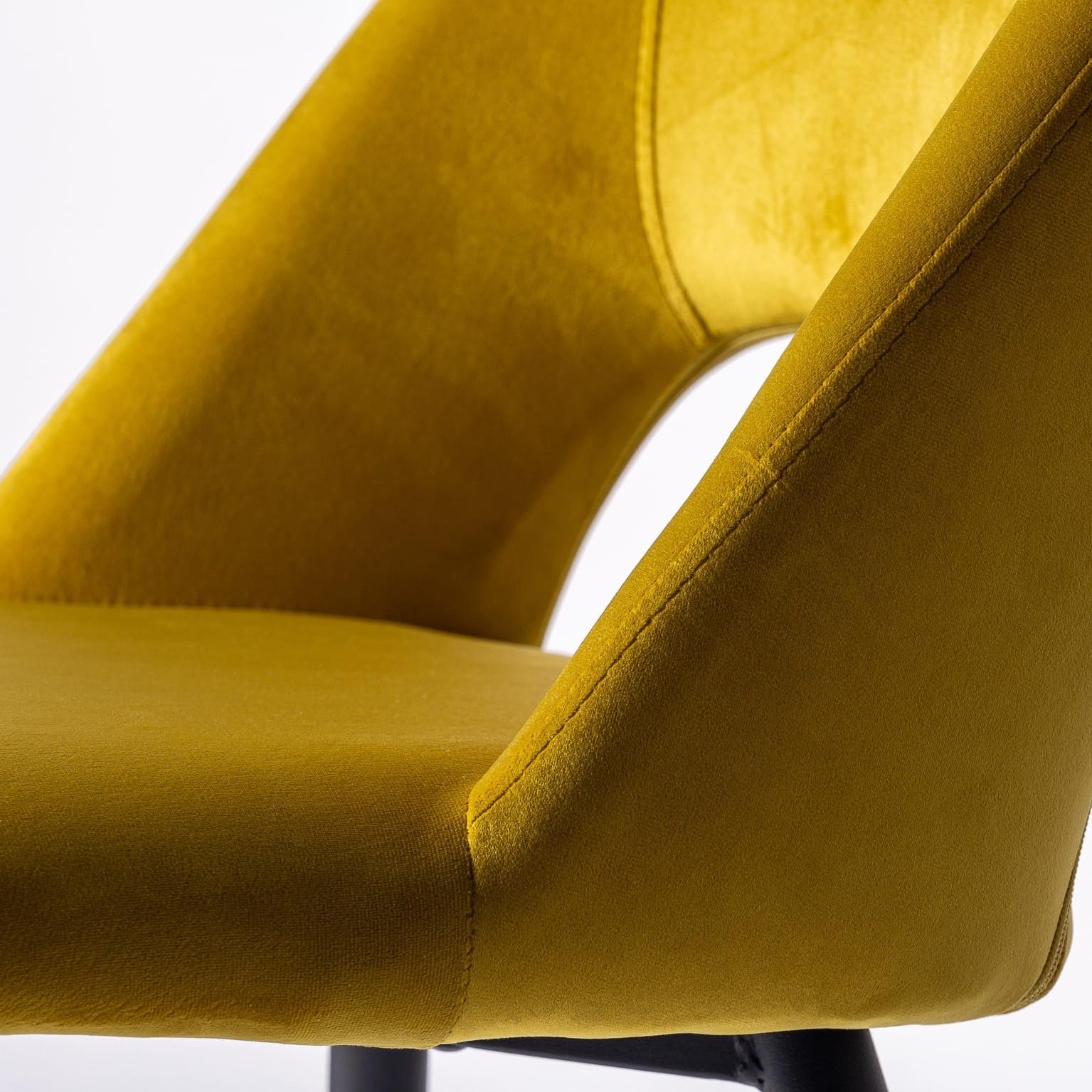1950s design style yellow velvet chair with black lacquered stainless steel feet and gild metal finishes.