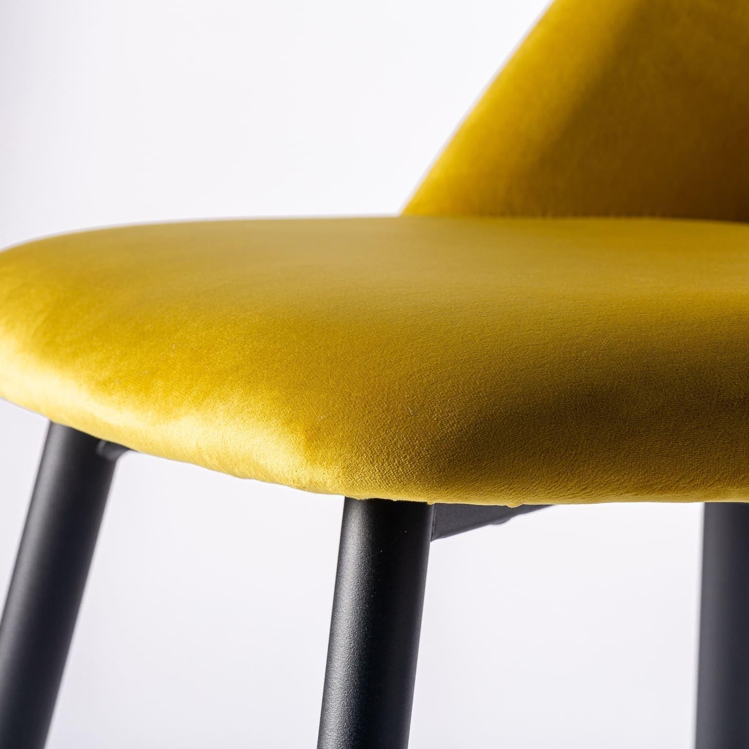 yellow velvet armchair