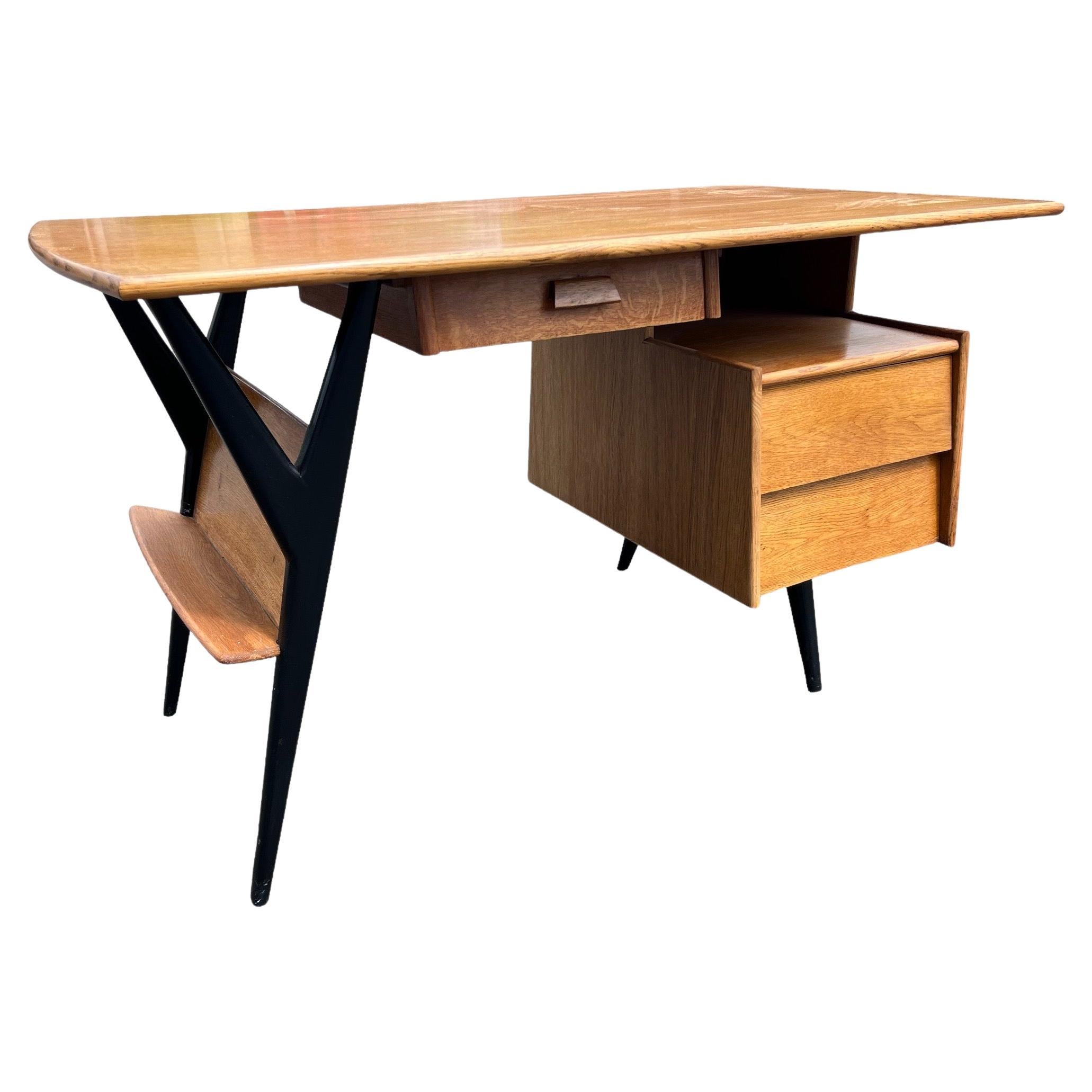 1950's desk by Louis Paolozzi  For Sale