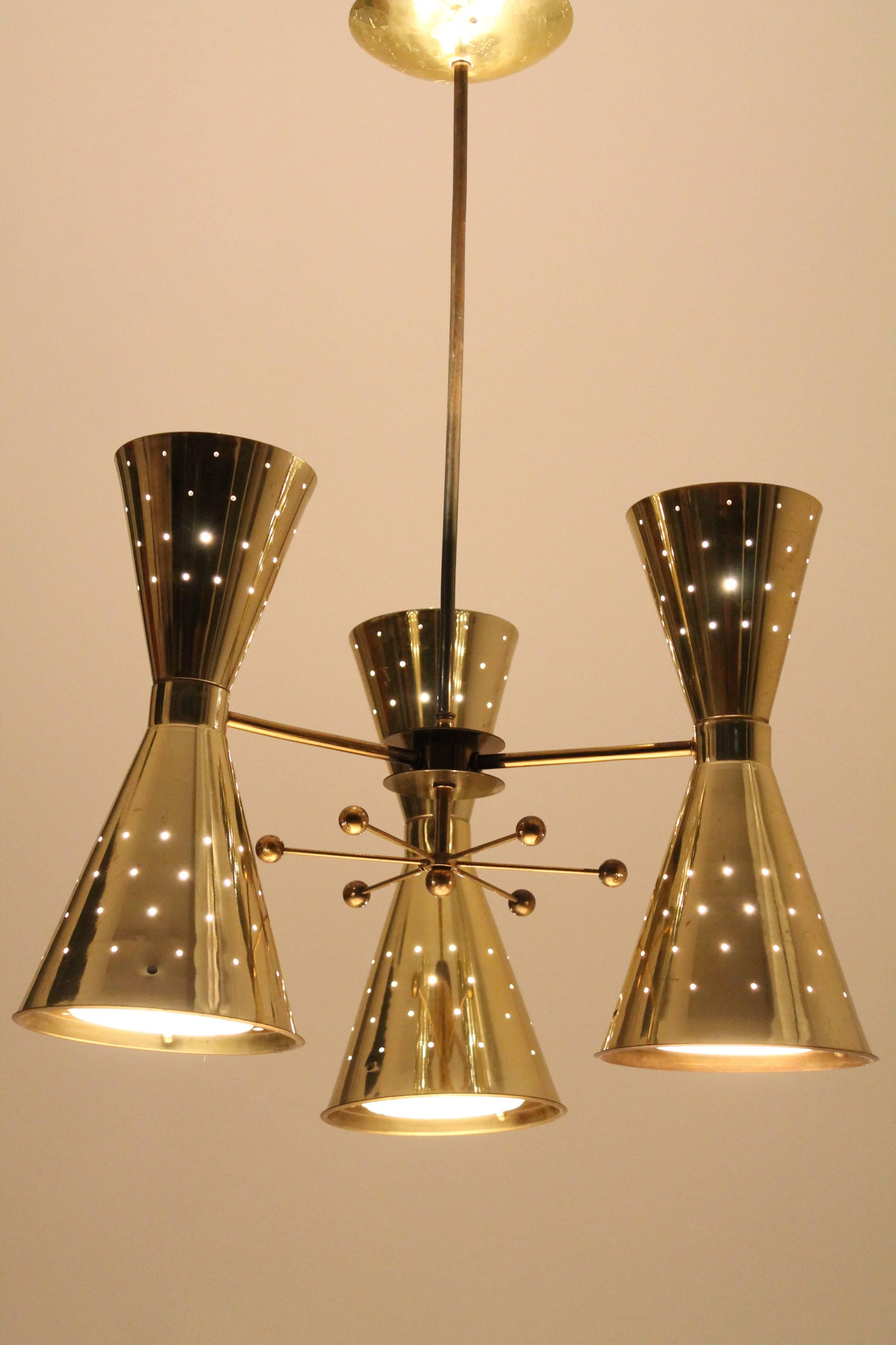 1950s Diabolo, Hourglass Pierced Brass-Plated Chandelier with Glass Lens In Good Condition In St- Leonard, Quebec