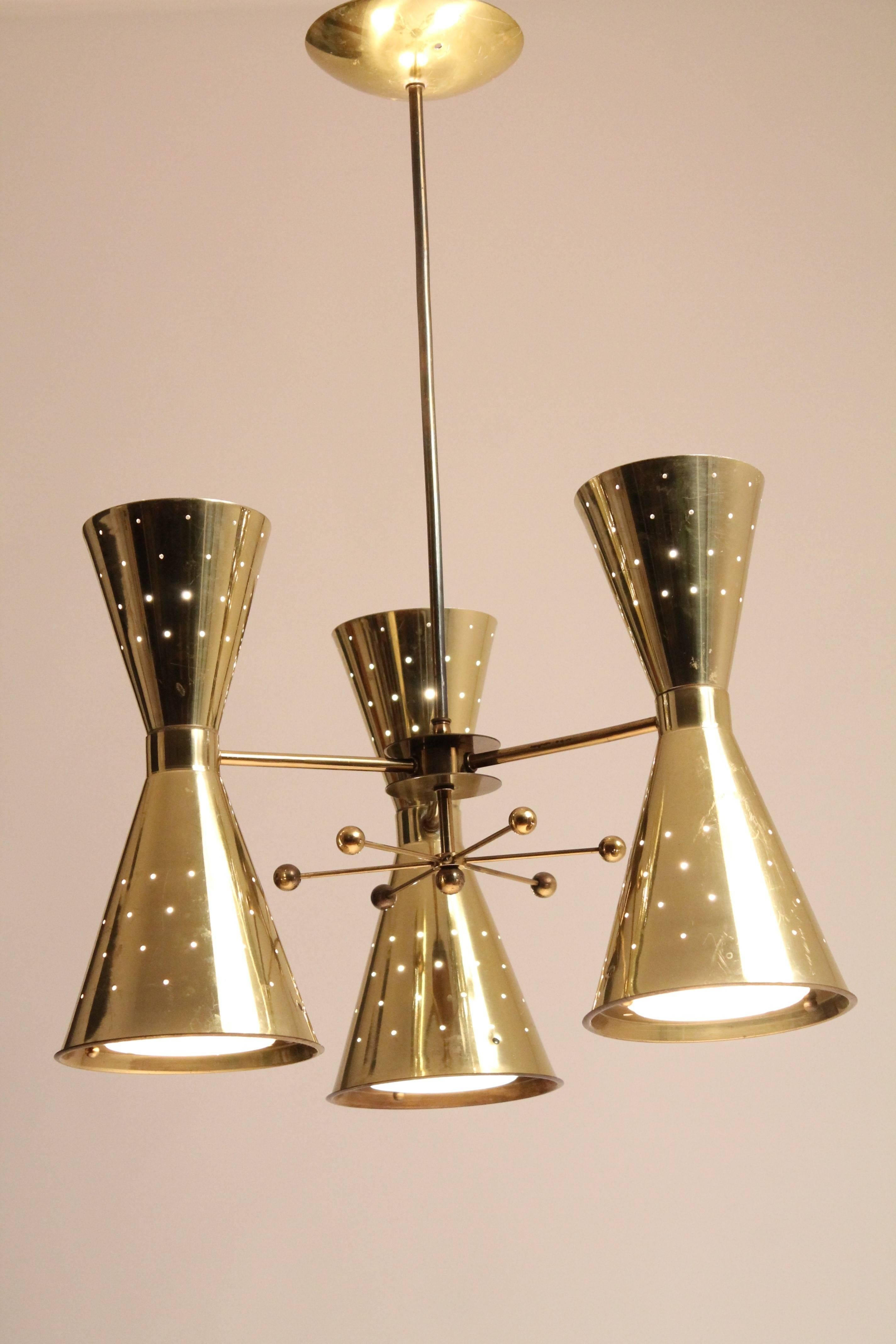 Mid-20th Century 1950s Diabolo, Hourglass Pierced Brass-Plated Chandelier with Glass Lens