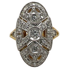 1950
s Diamond 18 Karat White 
Yellow Gold Oval Vintage Cocktail Ring