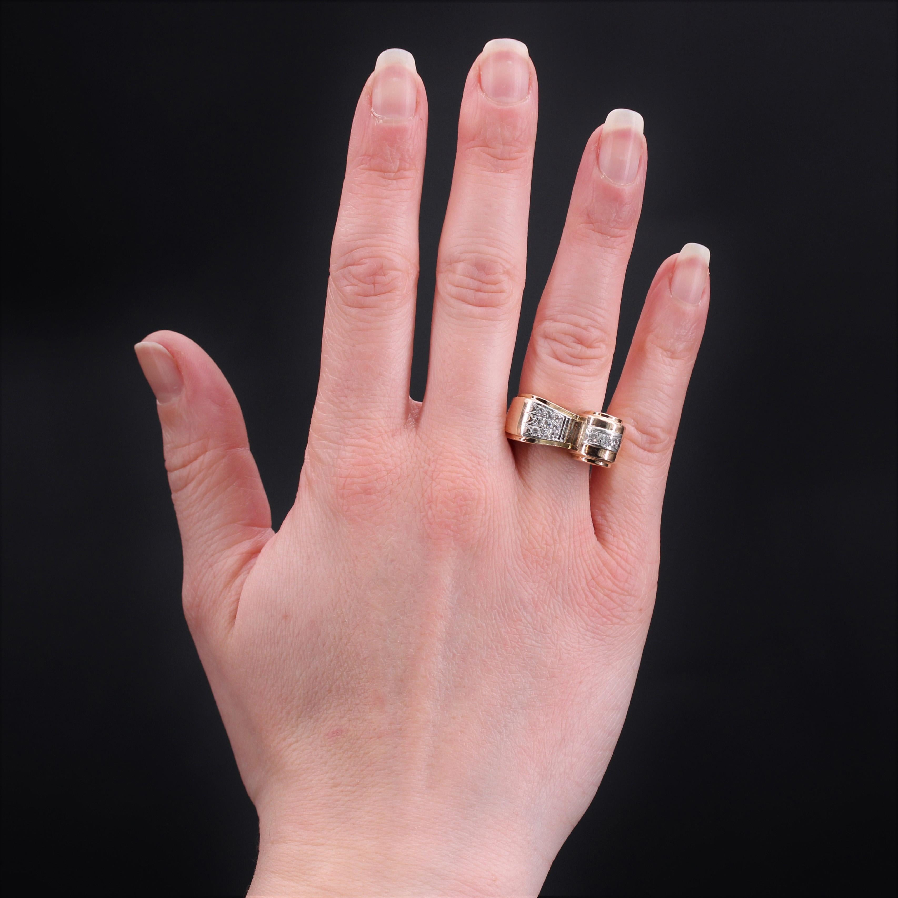 Ring in 18 karat yellow gold, gazelle head hallmark, and platinum.
Magnificent and comfortable tank ring, it presents an asymmetrical setting decorated on one side with a line of 3 brilliant-cut diamonds, and on the other with 9 brilliant-cut