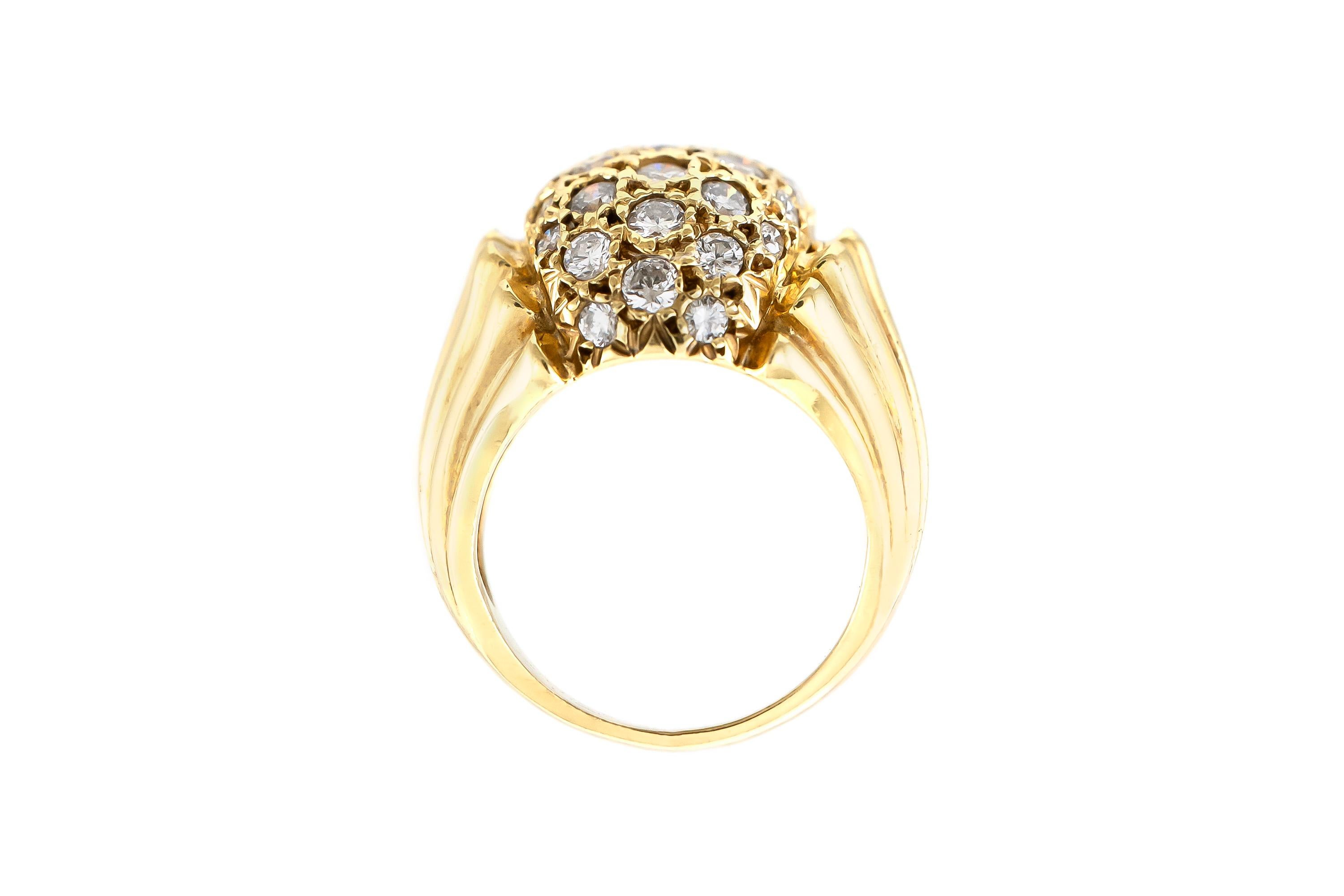 The ring is finely crafted in 14k yellow gold with diamonds weighing approximately total of 1.00.
Circa 1950