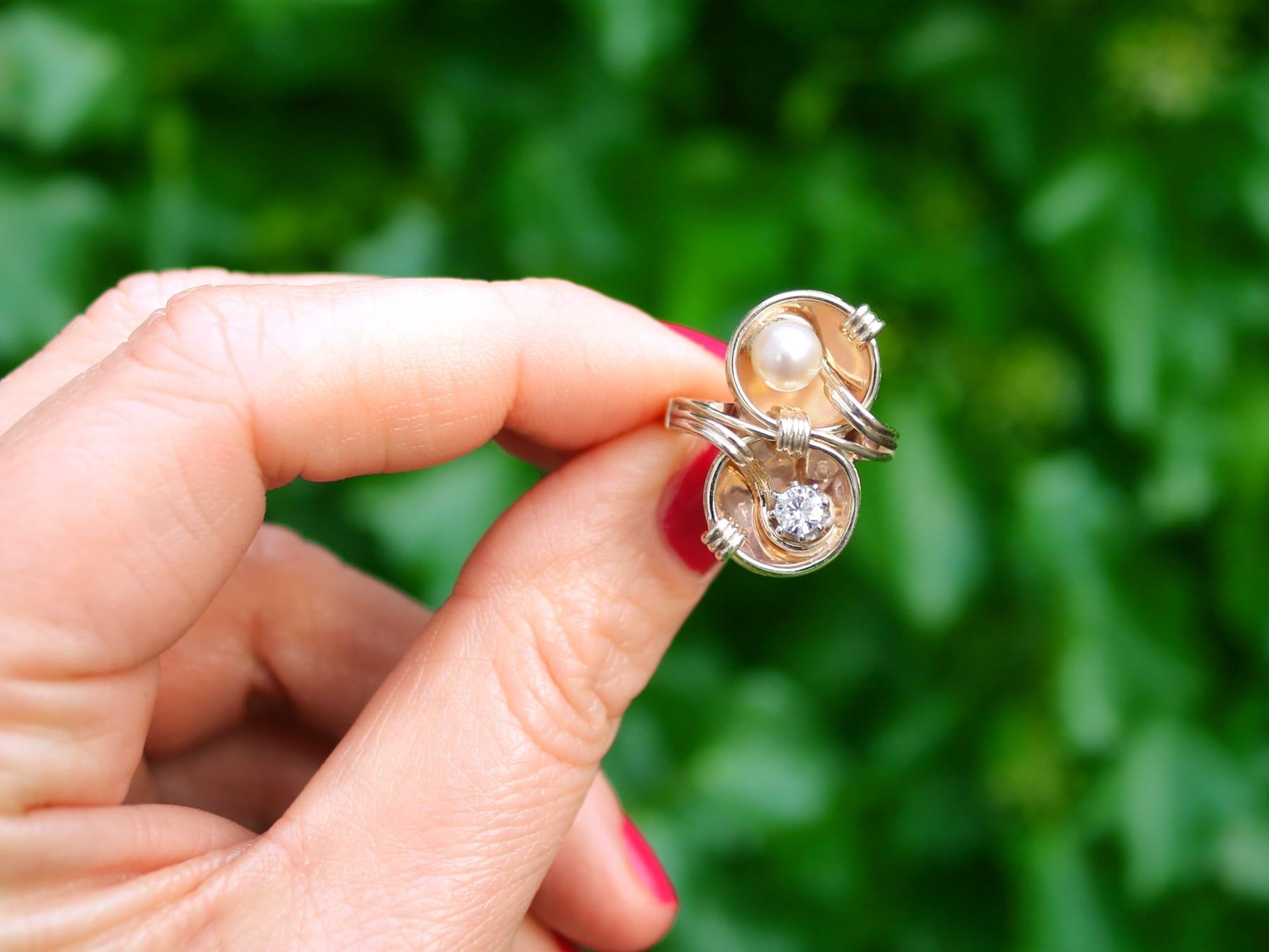 A fine and impressive, unusual vintage 0.23 carat diamond and pearl, 14 karat rose and yellow gold, 14 karat white gold set cocktail ring; part of our diverse jewelry collections.

This fine and impressive vintage pearl and diamond ring has been