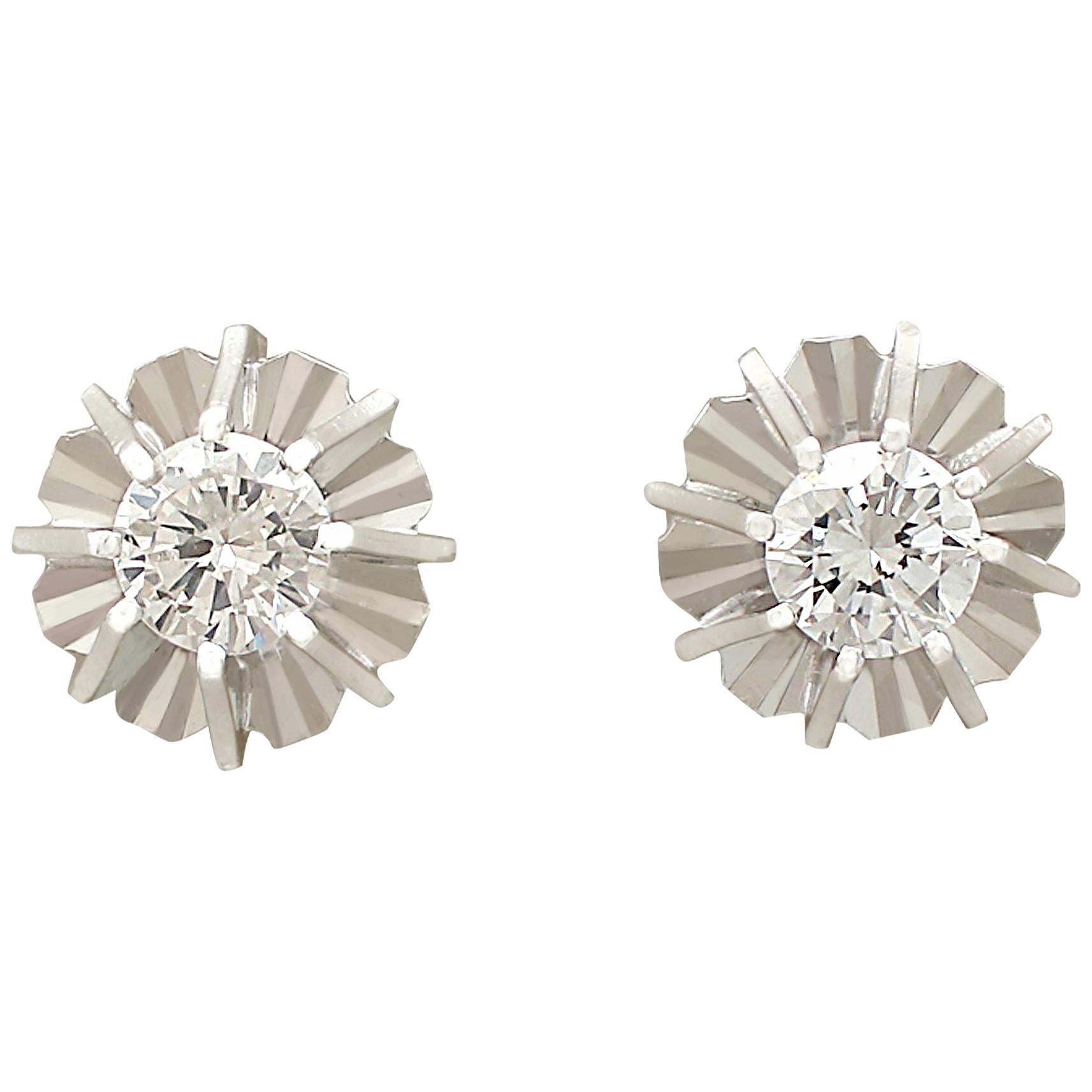 An impressive pair of vintage 0.56 carat diamond and 18 karat white gold stud style earrings; part of our diverse diamond jewellery and estate jewelry collections.

These fine and impressive diamond stud earrings have been crafted in 18k white