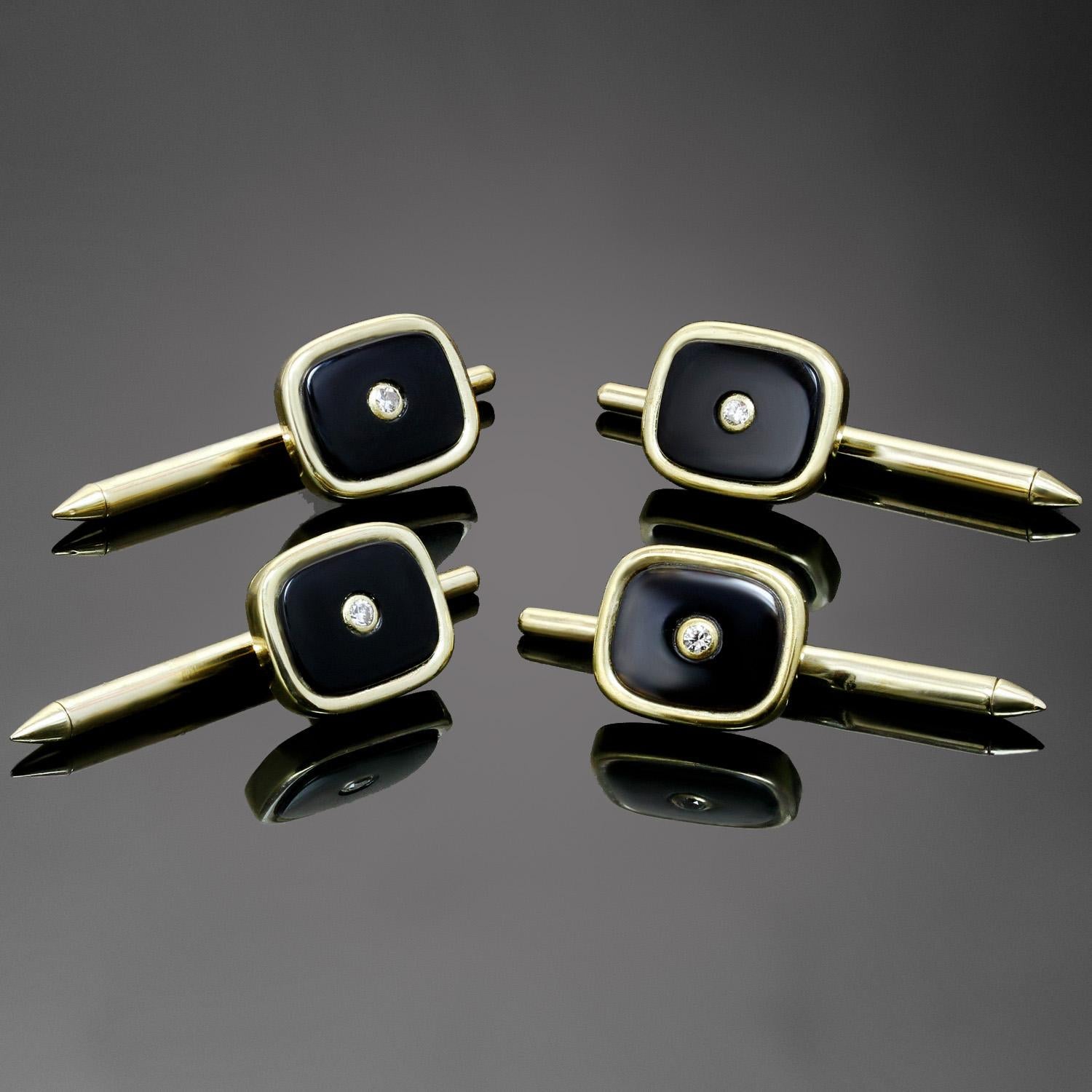 This classic vintage 1950s set of 4 rectangular button studs for men is crafted in 18k yellow gold and set with black onyx and brilliant-cut round diamond centers weighing an estimated 0.12 carats. Completed with makers mark GJ and stamp 750 for 18k