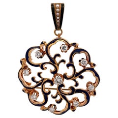 1950's Ciondolo a forma di cerchio con diamante e smalto blu in oro giallo 14 carati