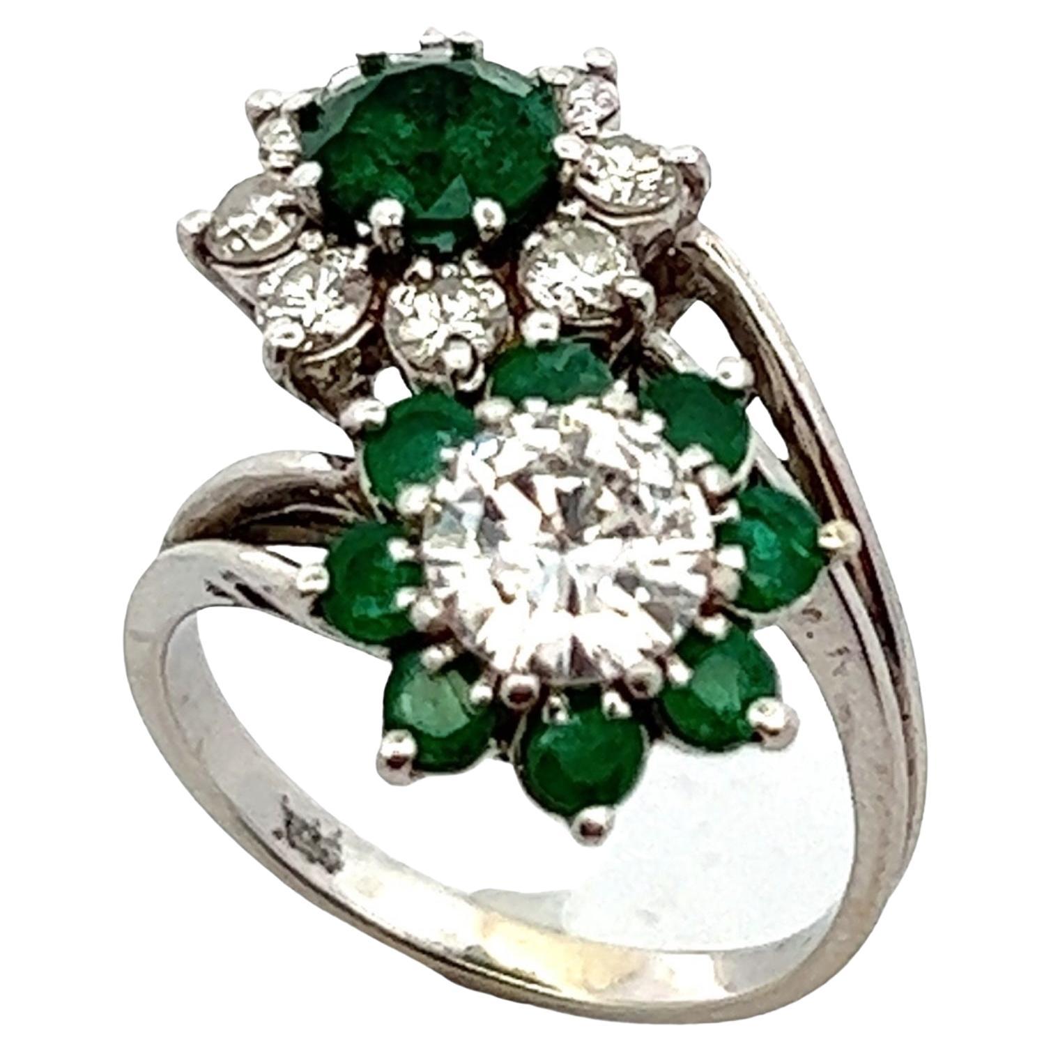 1950s Diamond Emerald 18 Karat White Gold Bypass Cocktail Estate Ring For Sale