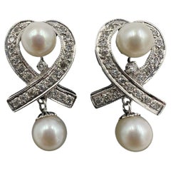 Boucles d'oreilles pendantes diamantées et perles des années 1950