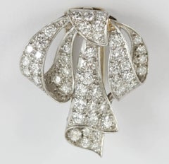 Vintage Tied Ribbon Brooch in Platinum set with Diamonds, English circa 1950