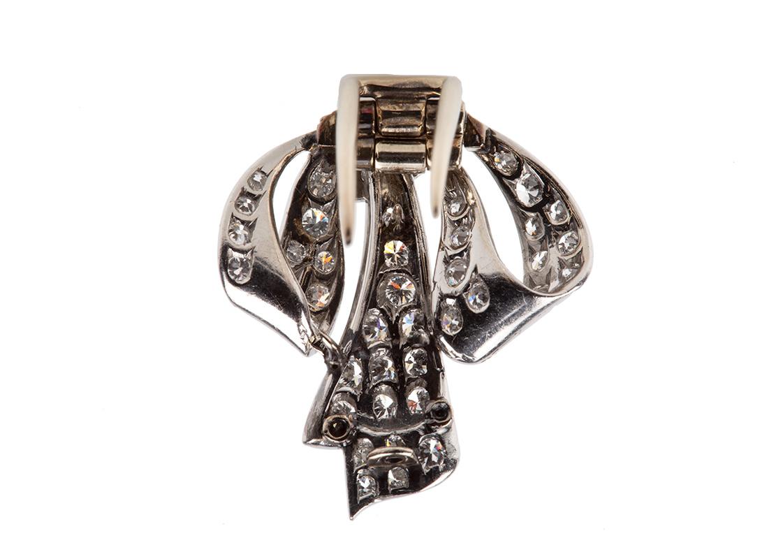 Round Cut Vintage Tied Ribbon Brooch in Platinum set with Diamonds, English circa 1950 For Sale