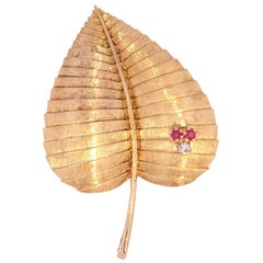 1950s Diamond Ruby 18 Karat Yellow Gold Leaf Brooch