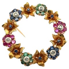 1950
s Diamond Ruby Emerald Sapphire 18 Karat Yellow Gold Flower Circle Brooch