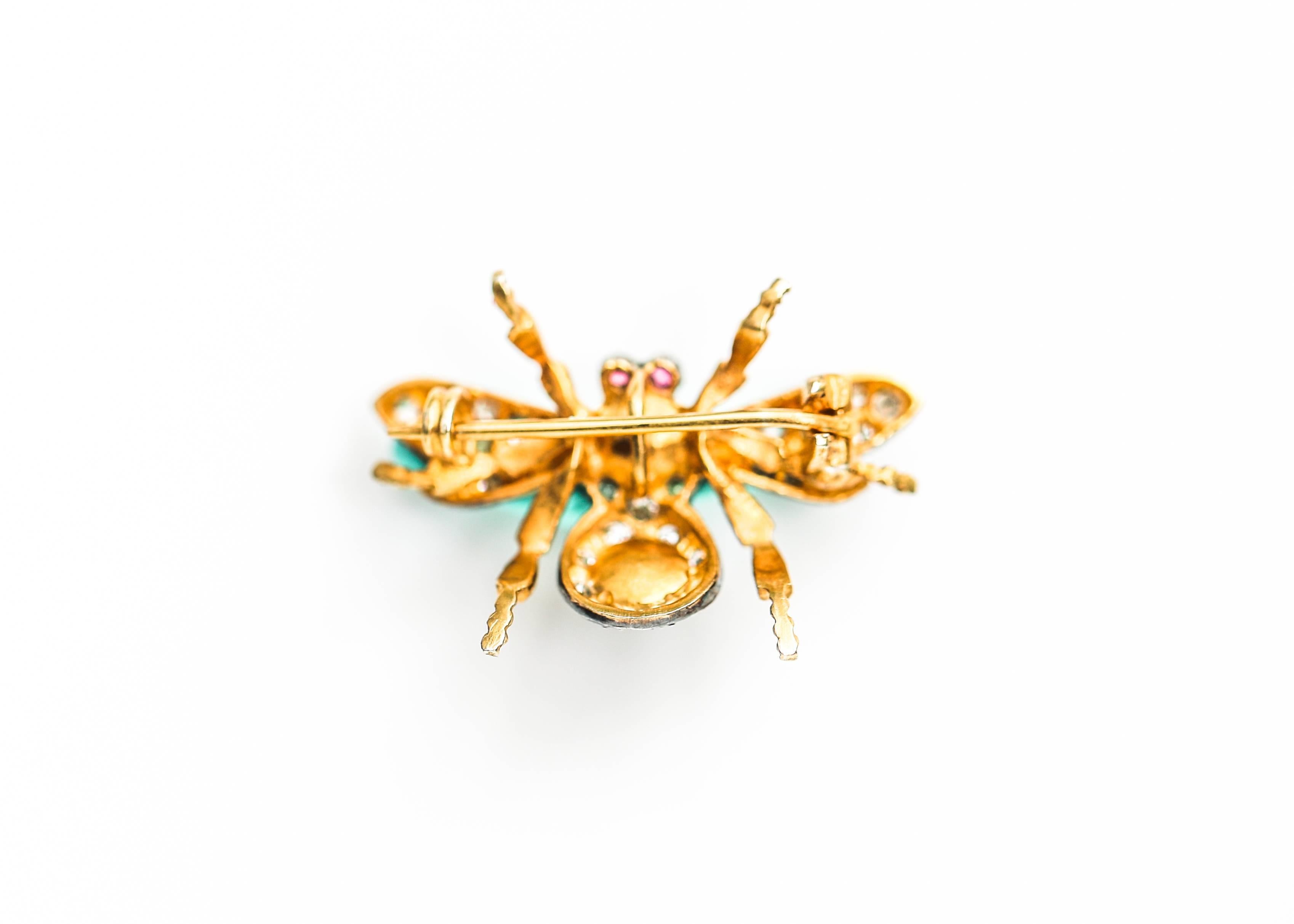 1950 Retro Diamond, Opal, Ruby Insect Convertible Pin with 18 Karat Yellow Gold and Sterling Silver

This Darling, diminutive Pin features 2 round Opal cabochons, 2 round Rubies and .20 carats of Diamonds. Diamonds cover the 4 wings and embellish