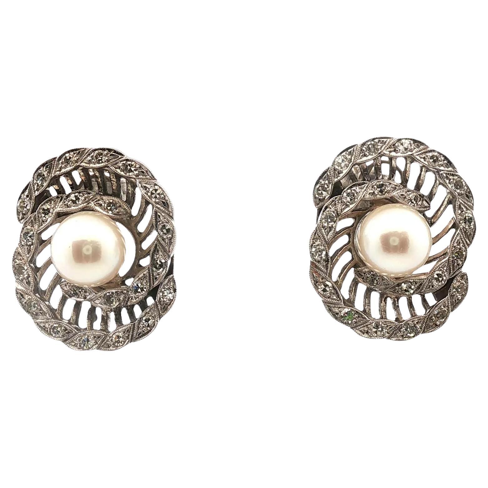 Pendientes vintage de oro blanco de 14 quilates en forma de espiral con diamantes de los años 50