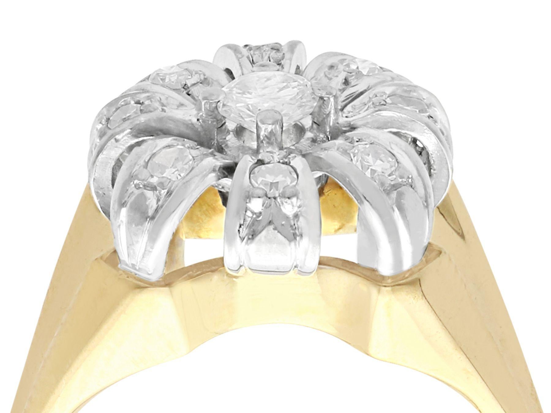 An impressive vintage European 0.41 carat diamond and 14 karat yellow gold, 14 karat white gold set cluster ring; part of our diverse diamond jewelry collections.

This fine and impressive 1950s cluster ring has been crafted in 14k yellow gold with