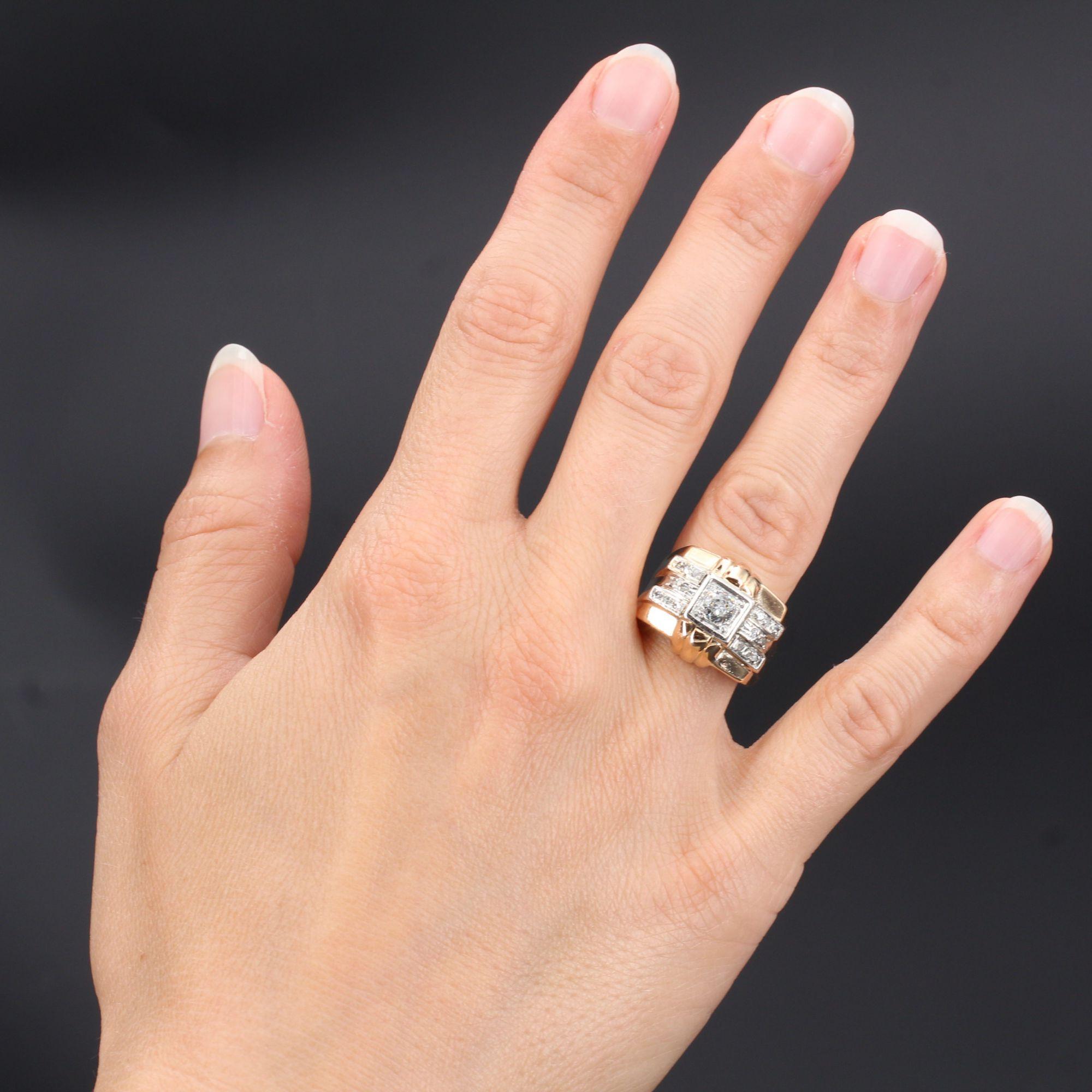 Ring in 18 karat rose gold, and platinum.
This beautiful tank ring is set in the center of an antique brilliant- cut diamond set with claws. It is supported by rectangular motifs set with rose-cut diamonds and two gadrooned pattern on the other side