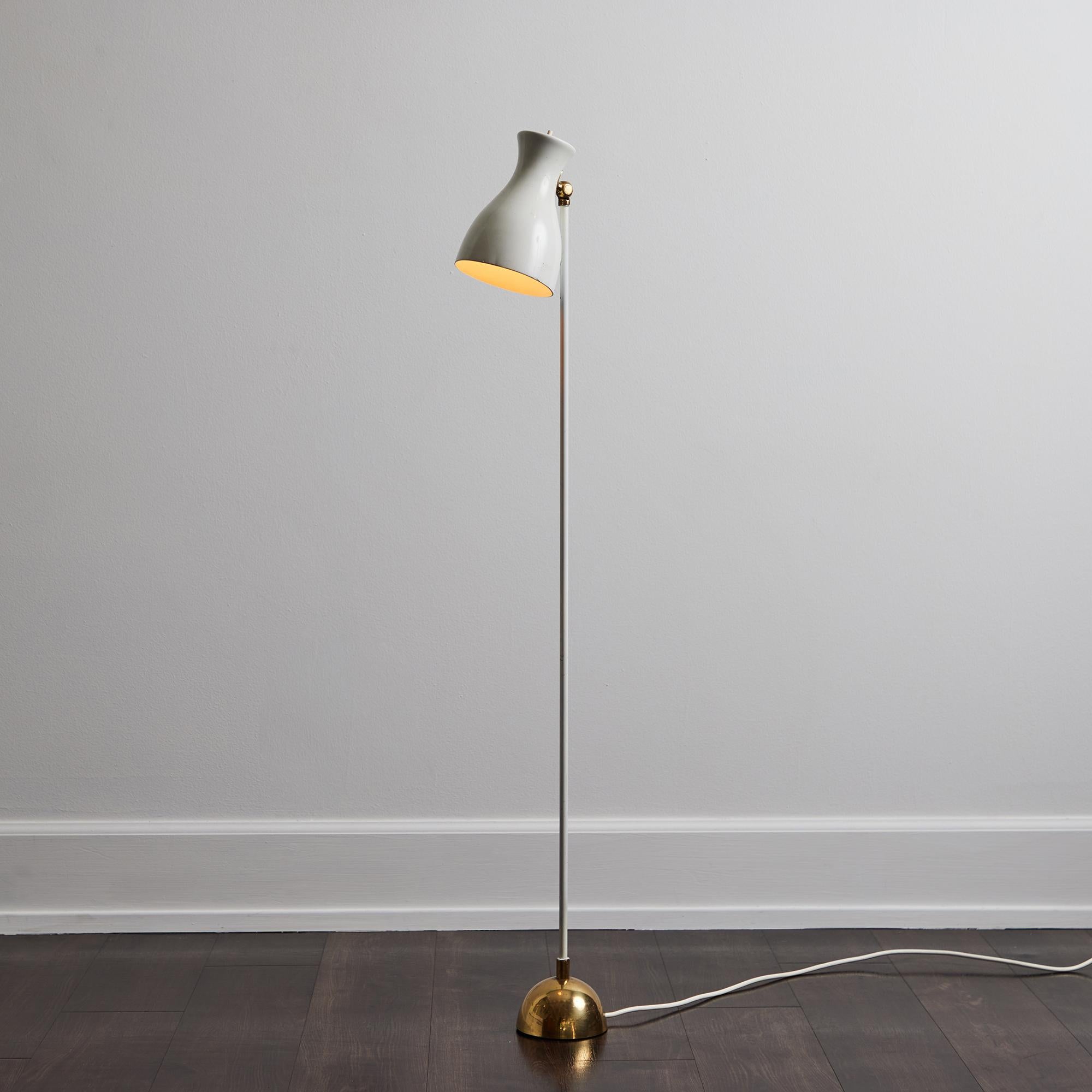 1950s Dieter Schulz Model No. 57/416 Floor Lamp for Wohnbedarf AG Schweiz. 

Executed in white painted metal and brass. A quintessentially midcentury European design that is highly functional and incomparably refined. Reminiscent of and often