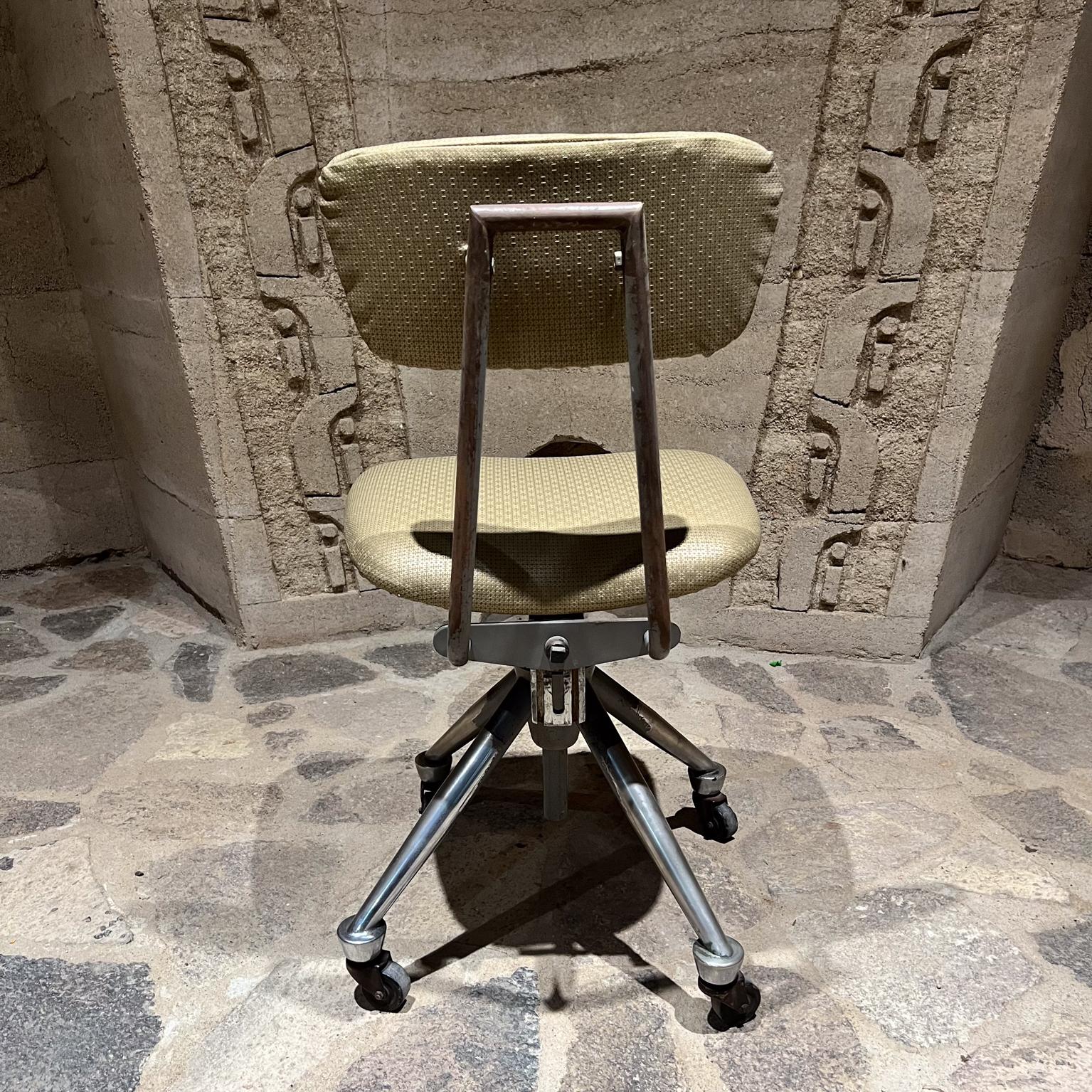 For your consideration, 1950s Do More Office Chair Mid-Century Modern industrial era.
Domore Chair Company Inc founded in 1922 
by William S. Ferris in Elkhart, Indiana.
Seat height adjustable.
Four-star base original chrome and rubber