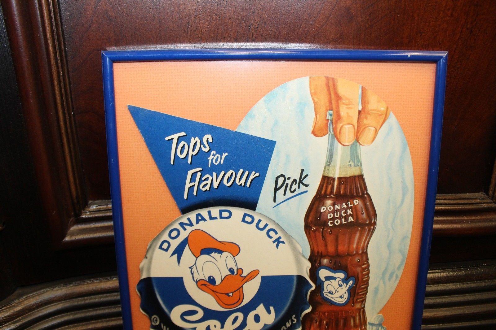 Original Donald Duck Cola sign from 1950. Die cut cardboard. Marked 