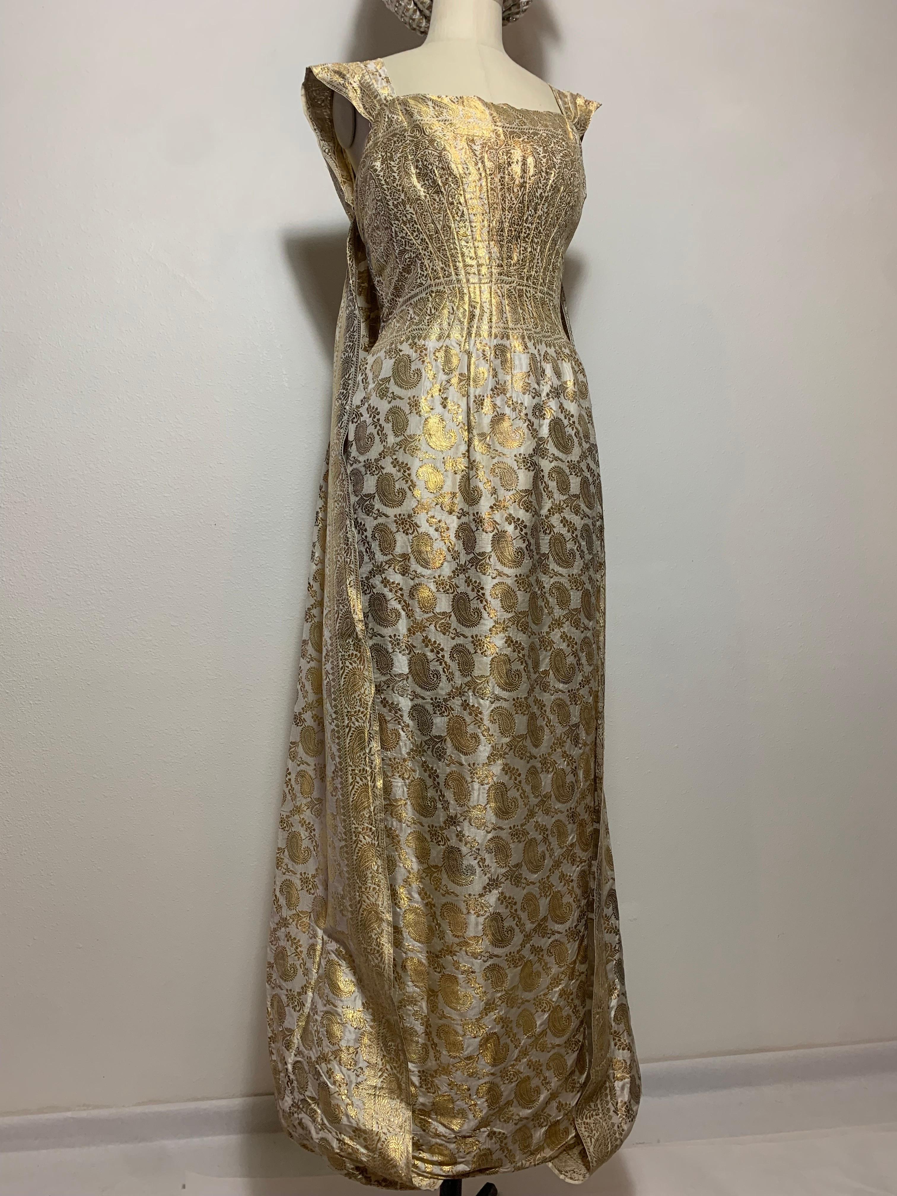 1950s Dorothy McNab Gold Lame & White Silk Sari-Inspired Gown w Draped Attached Waterfall Back, and Incredible Princess Seamed Bodice.  Gold lame woven paisley patterns are seamed and darted at bodice to create a solid gold waist panel. Pleated