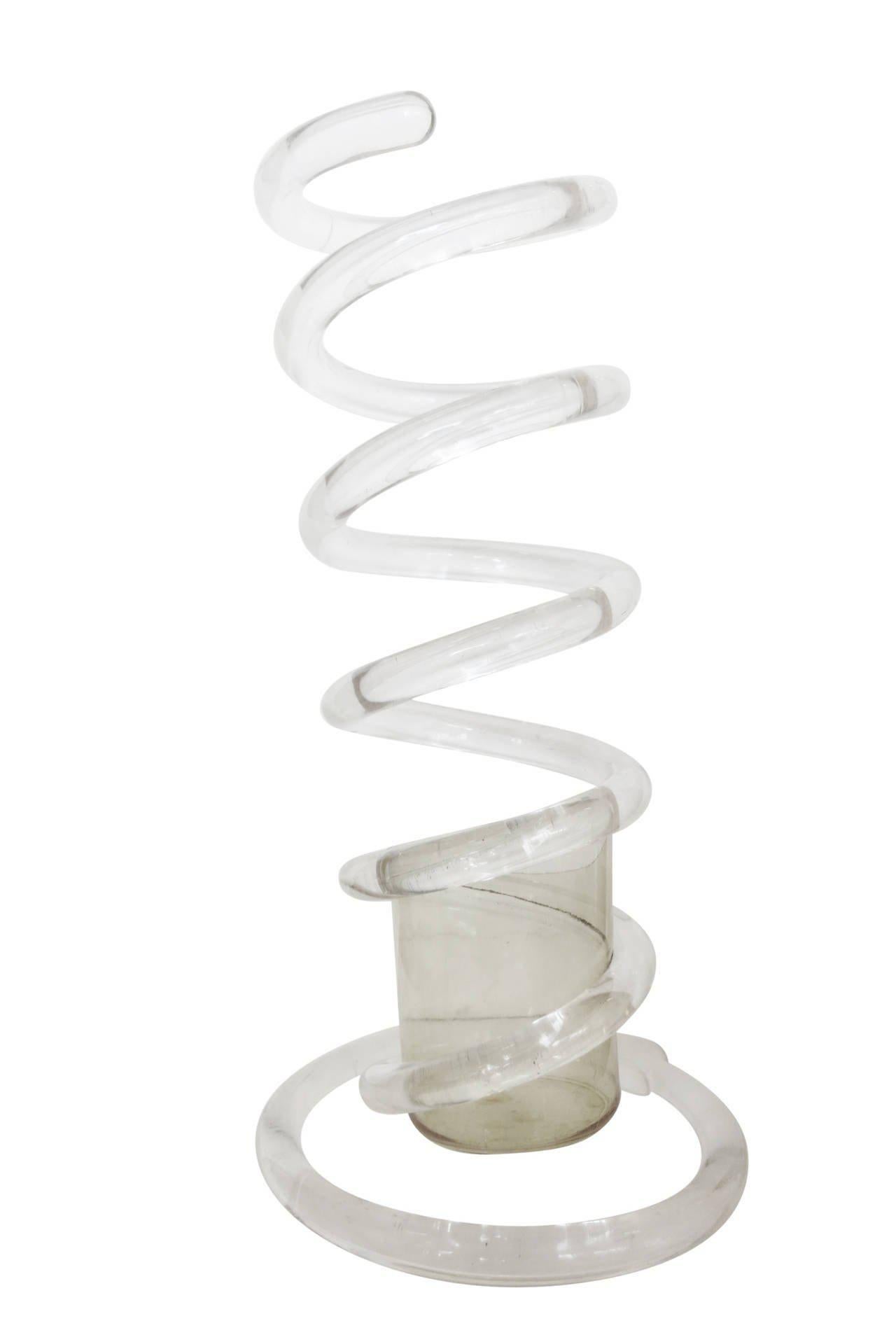 Dorothy Thorpe Spiral Spring Umbrella lucite stand. This piece of early lucite sculptural art features a piece of lucite spun into a spring shape with a small holder along the bottom.

All the qualities that made lucite a beguiling Material in the
