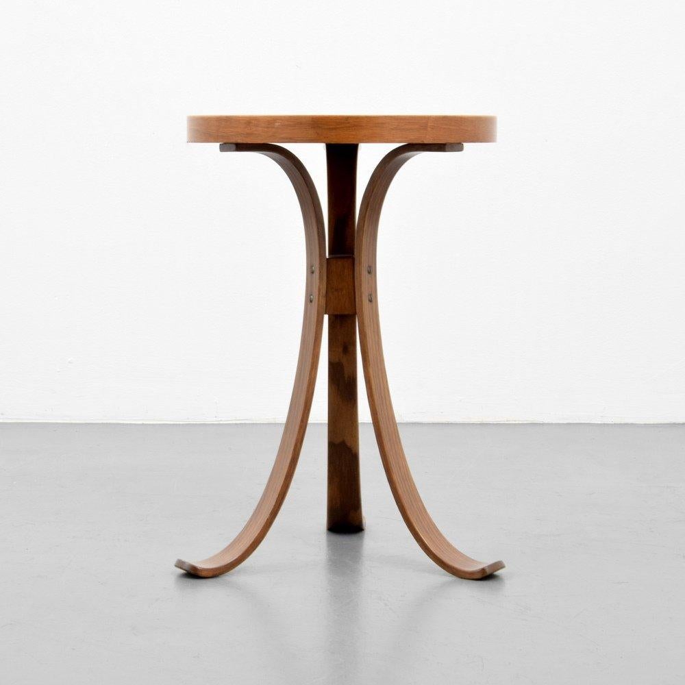 Dunbar Constellation table by Edward Wormley. Sculptural wood frame with a laminated top.