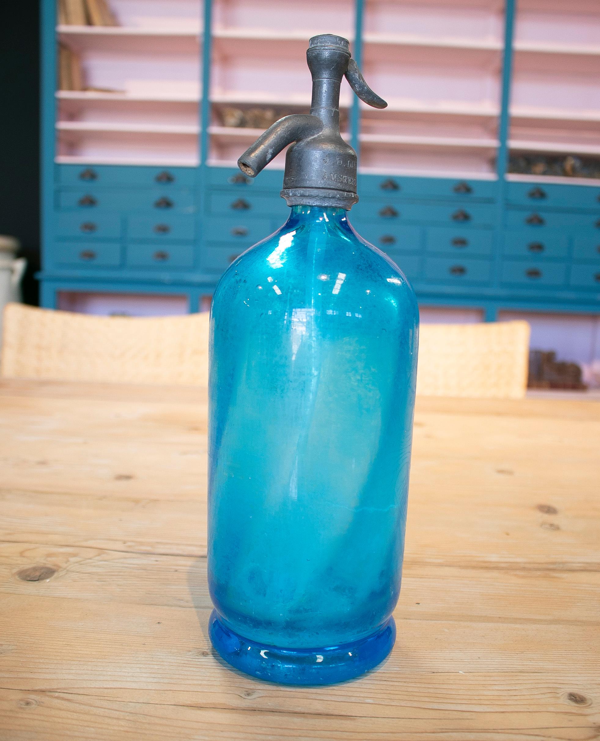 blue soda in glass bottles