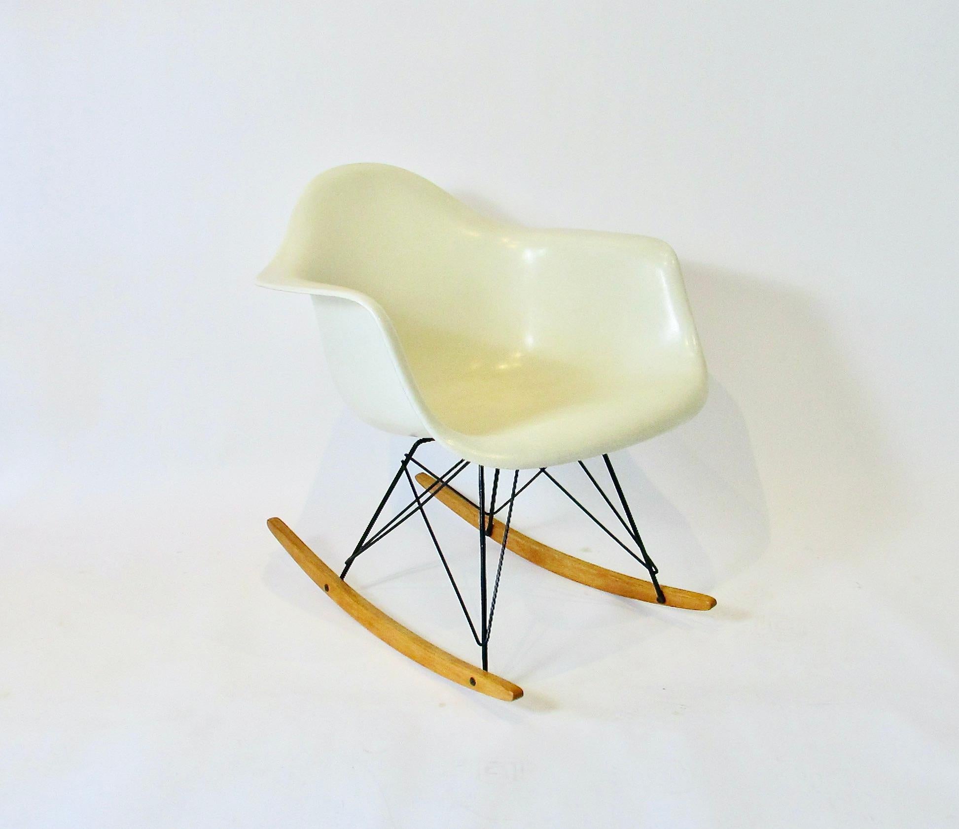 Charles and Ray Eames design for Herman Miller. RAR ( Rocking Arm steel Rod ) chair. Late 1950s production chair second generation shock mounts . Date stamp looks to be 1958 . Fine  condition with no blemishes or shock mount bleed through. Maple