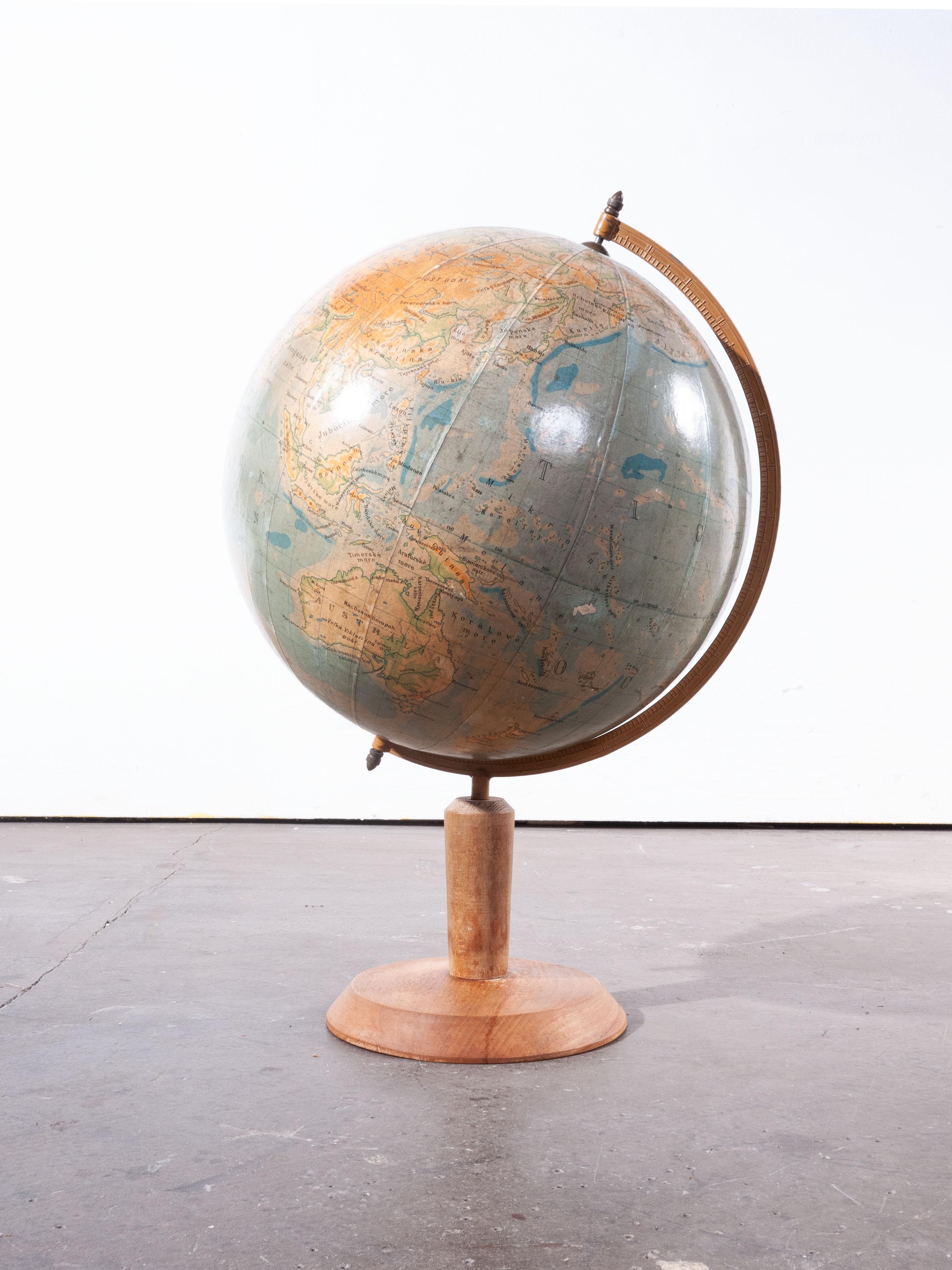 1950s Earth rotating teaching globe

1950s earth rotating teaching globe. Sourced from a Czech collector, this geographic teaching globe is in exceptional condition. Contemporary 30cm striped ruler for scale reference only, not included in the