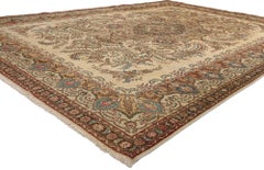 1950's Earth-Tone Persian Tabriz Rug with Traditional Style