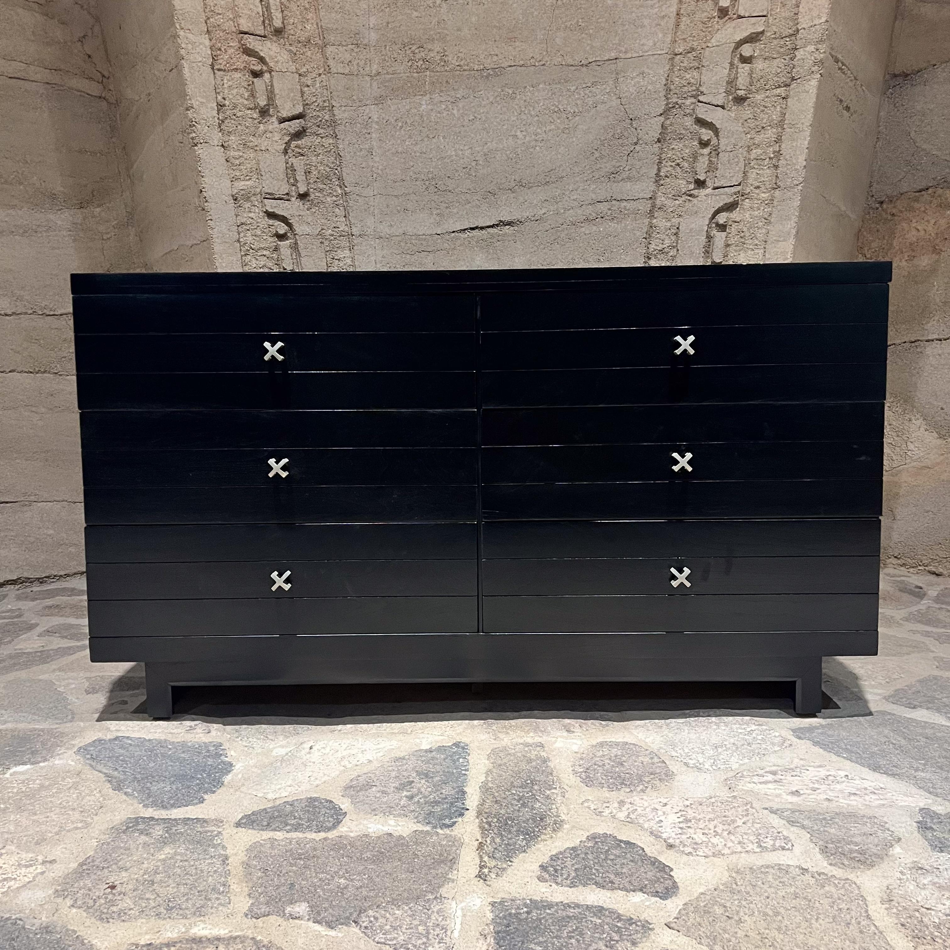 For your consideration, a MCM Ebonized Dresser attributed to Paul Frankl.
Double dresser, 3 drawers per side. All drawers open and close with ease. 
Iconic 