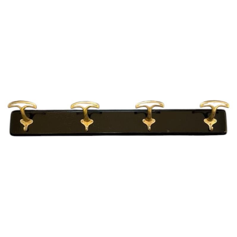 1950s Ebonized Wood Coat Rack With Brass Knobs For Sale